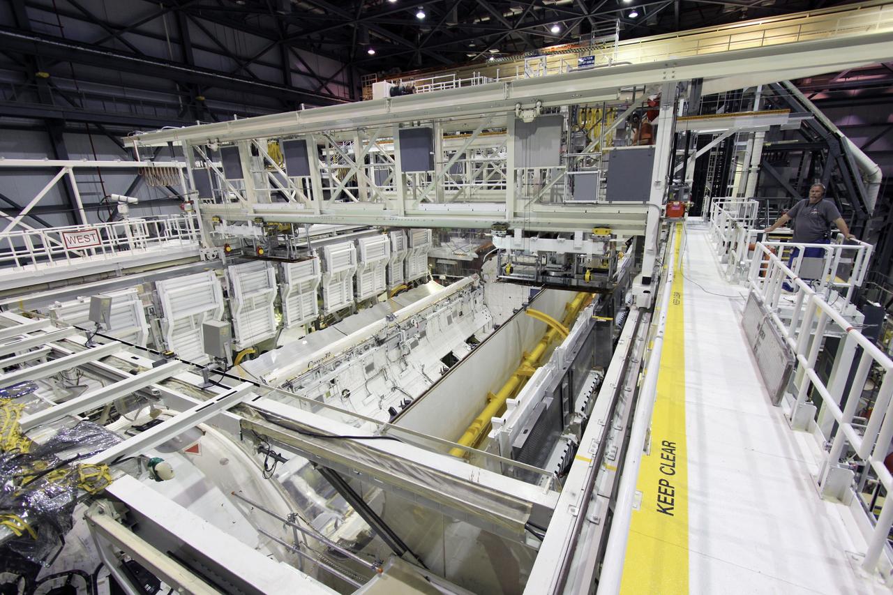 CAPE CANAVERAL, Fla. – In Orbiter Processing Facility-1 at NASA’s Kennedy Space Center in Florida, operations to open the payload bay doors of space shuttle Atlantis are well under way. The work is part of the Space Shuttle Program’s transition and retirement processing of shuttle Atlantis. A groundbreaking was held Jan. 18 for Atlantis' future home -- a 65,000-square-foot exhibit hall in Shuttle Plaza at the Kennedy Space Center Visitor Complex. For more information, visit http://www.nasa.gov/shuttle. Photo credit: NASA/Jim Grossmann
