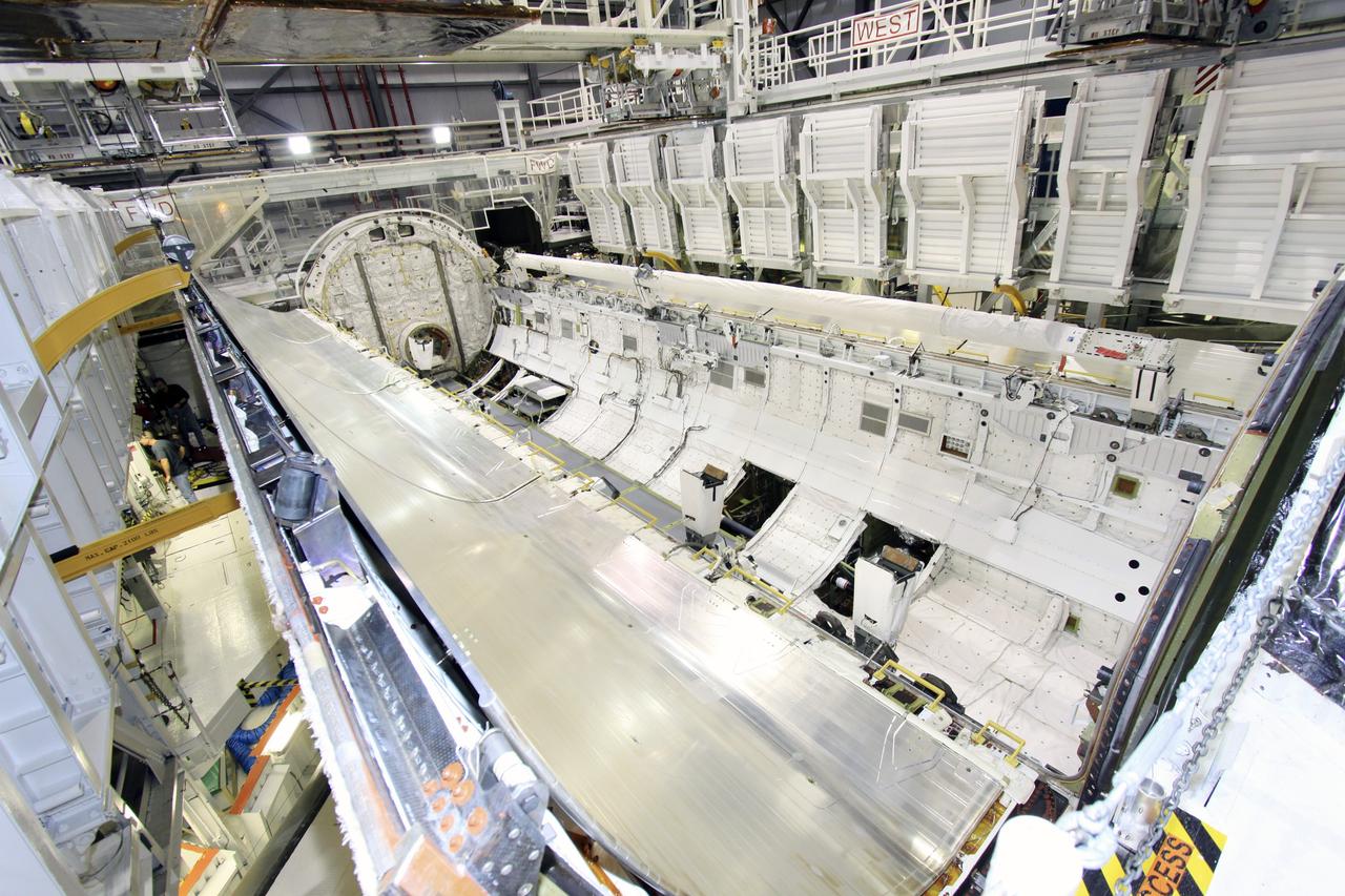 CAPE CANAVERAL, Fla. – In Orbiter Processing Facility-1 at NASA’s Kennedy Space Center in Florida, the payload bay of space shuttle Atlantis is accessible and ready for processing activities following the opening of its doors. The work is part of the Space Shuttle Program’s transition and retirement processing of shuttle Atlantis. A groundbreaking was held Jan. 18 for Atlantis' future home -- a 65,000-square-foot exhibit hall in Shuttle Plaza at the Kennedy Space Center Visitor Complex. For more information, visit http://www.nasa.gov/shuttle. Photo credit: NASA/Jim Grossmann
