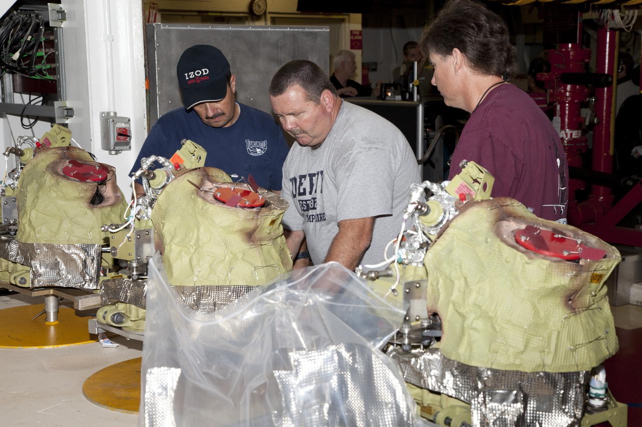 CAPE CANAVERAL, Fla. -- In Orbiter Processing Facility-2 at NASA’s Kennedy Space Center in Florida, United Space Alliance technicians have removed the auxiliary power units from space shuttle Endeavour and are inspecting them and preparing them for transport. The work is part of Endeavour’s transition and retirement processing. The spacecraft is being prepared for public display at the California Science Center in Los Angeles. Endeavour flew 25 missions, spent 299 days in space, orbited Earth 4,671 times and traveled 122, 883, 151 miles over the course of its 19-year career. For more information, visit http://www.nasa.gov/shuttle. Photo credit: NASA/Dimitri Gerondidakis
