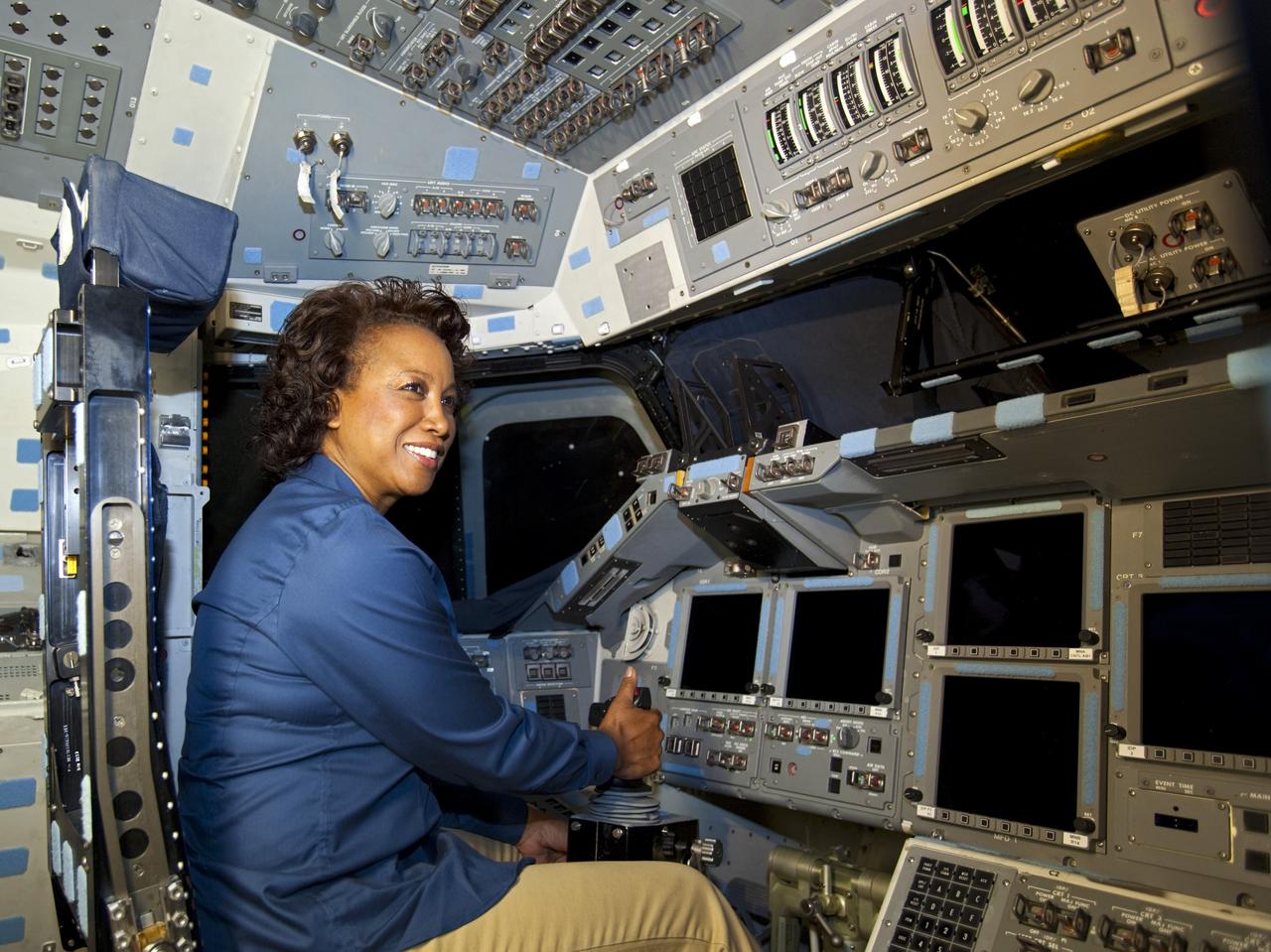 CAPE CANAVERAL, Fla. – Florida’s Lt. Gov. Jennifer Carroll sits in the commander’s seat on the flight deck of space shuttle Atlantis during a tour of Kennedy Space Center’s Orbiter Processing Facility-1. The tour coincided with Carroll’s visit to Kennedy for a meeting with Cabana. Atlantis is being prepared for public display at the Kennedy Space Center Visitor Complex in 2013. The groundbreaking for Atlantis’ exhibit hall took place in January Atlantis is scheduled to be moved to the visitor complex in November. For more information, visit http://www.nasa.gov/shuttle. Photo credit: NASA/Jim Grossmann