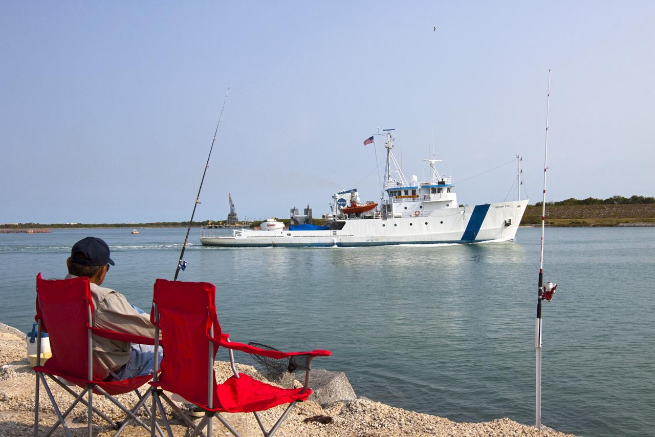 CAPE CANAVERAL, Fla. -- NASA’s Freedom Star boat sets out for a day of testing after departing through Port Canaveral in Florida for the Atlantic Ocean with NASA’s Mobile Aerospace Reconnaissance System, or MARS, secured aboard. MARS, run by NASA’s Langley Research Center in Hampton, Va., with its spatial, hyperspectral, thermal, and directed energy capabilities will be used for thermal imaging testing for the upcoming SpaceX Falcon 9 and Dragon capsule test flight to the International Space Station. During today’s test, the MARS X-band radar and kineto tracking mount KTM were tested to ensure that they were synchronized to receive a rocket launch feed. The radar was used to identify an object to see if the KTM could lock on to and track it. The MARS team performed maintenance on the system, confirmed communications links, and tested the design of the mounting system and environmental enclosure. Photo credit: NASA/Jim Grossmann