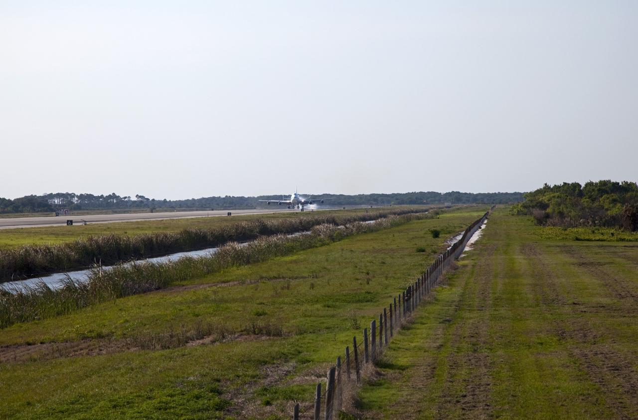 CAPE CANAVERAL, Fla. – The Shuttle Carrier Aircraft touches down at the Shuttle Landing Facility at NASA’s Kennedy Space Center in Florida.    The aircraft, known as an SCA, arrived at 5:35 p.m. EDT to prepare for shuttle Discovery’s ferry flight to the Washington Dulles International Airport in Sterling, Va., on April 17. This SCA, designated NASA 905, is a modified Boeing 747 jet airliner, originally manufactured for commercial use. One of two SCAs employed over the course of the Space Shuttle Program, NASA 905 is assigned to the remaining ferry missions, delivering the shuttles to their permanent public display sites.  NASA 911 was decommissioned at the NASA Dryden Flight Research Center in California in February. Discovery will be placed on permanent public display in the Smithsonian's National Air and Space Museum Steven F. Udvar-Hazy Center in Chantilly, Va.  For more information on the SCA, visit http://www.nasa.gov/centers/dryden/news/FactSheets/FS-013-DFRC.html. For more information on shuttle transition and retirement activities, visit http://www.nasa.gov/shuttle. Photo credit: NASA/Frankie Martin