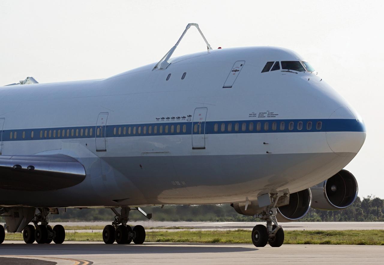 CAPE CANAVERAL, Fla. – NASA pilot Jeff Moultrie guides the Shuttle Carrier Aircraft along the apron of the runway at the Shuttle Landing Facility at NASA’s Kennedy Space Center in Florida.    The aircraft, known as an SCA, arrived at 5:35 p.m. EDT to prepare for shuttle Discovery’s ferry flight to the Washington Dulles International Airport in Sterling, Va., on April 17. This SCA, designated NASA 905, is a modified Boeing 747 jet airliner, originally manufactured for commercial use. One of two SCAs employed over the course of the Space Shuttle Program, NASA 905 is assigned to the remaining ferry missions, delivering the shuttles to their permanent public display sites.  NASA 911 was decommissioned at the NASA Dryden Flight Research Center in California in February. Discovery will be placed on permanent public display in the Smithsonian's National Air and Space Museum Steven F. Udvar-Hazy Center in Chantilly, Va.  For more information on the SCA, visit http://www.nasa.gov/centers/dryden/news/FactSheets/FS-013-DFRC.html. For more information on shuttle transition and retirement activities, visit http://www.nasa.gov/shuttle. Photo credit: NASA/Kim Shiflett