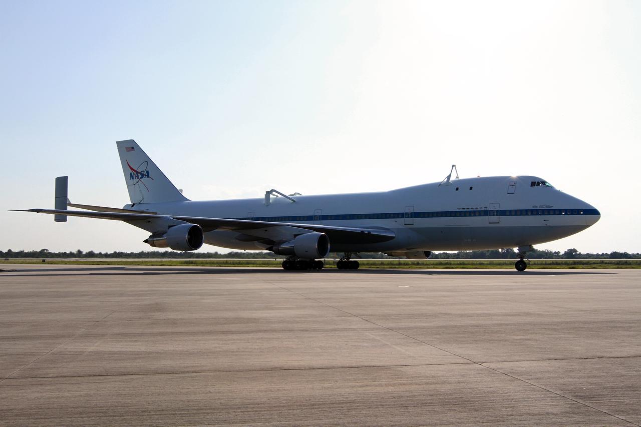 CAPE CANAVERAL, Fla. – NASA pilot Jeff Moultrie guides the Shuttle Carrier Aircraft onto the apron of the runway at the Shuttle Landing Facility at NASA’s Kennedy Space Center in Florida.    The aircraft, known as an SCA, arrived at 5:35 p.m. EDT to prepare for shuttle Discovery’s ferry flight to the Washington Dulles International Airport in Sterling, Va., on April 17. This SCA, designated NASA 905, is a modified Boeing 747 jet airliner, originally manufactured for commercial use. One of two SCAs employed over the course of the Space Shuttle Program, NASA 905 is assigned to the remaining ferry missions, delivering the shuttles to their permanent public display sites.  NASA 911 was decommissioned at the NASA Dryden Flight Research Center in California in February. Discovery will be placed on permanent public display in the Smithsonian's National Air and Space Museum Steven F. Udvar-Hazy Center in Chantilly, Va.  For more information on the SCA, visit http://www.nasa.gov/centers/dryden/news/FactSheets/FS-013-DFRC.html. For more information on shuttle transition and retirement activities, visit http://www.nasa.gov/shuttle. Photo credit: NASA/Kim Shiflett