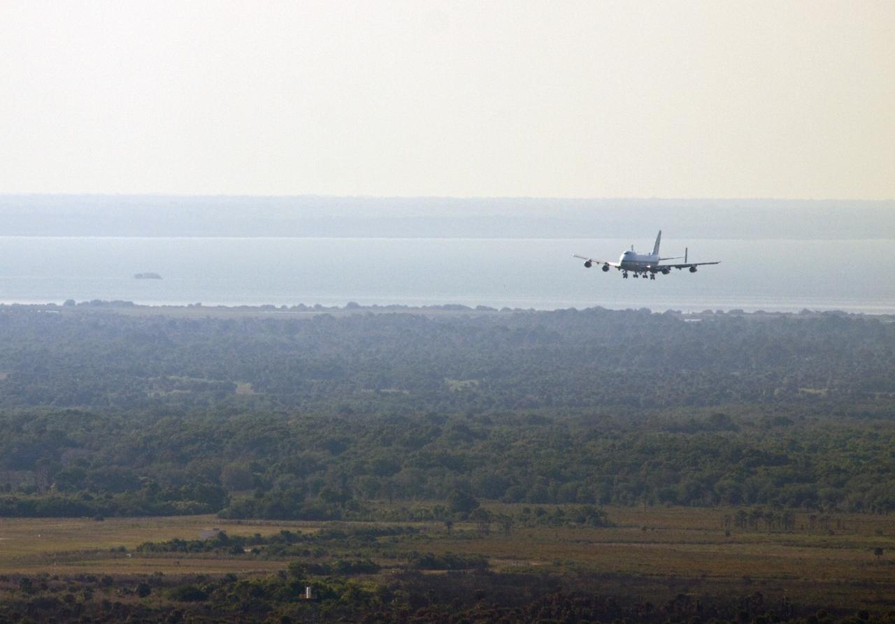 CAPE CANAVERAL, Fla. – The Shuttle Carrier Aircraft approaches the runway of the Shuttle Landing Facility at NASA’s Kennedy Space Center in Florida.    The aircraft, known as an SCA, arrived at 5:35 p.m. EDT to prepare for shuttle Discovery’s ferry flight to the Washington Dulles International Airport in Sterling, Va., on April 17. This SCA, designated NASA 905, is a modified Boeing 747 jet airliner, originally manufactured for commercial use. One of two SCAs employed over the course of the Space Shuttle Program, NASA 905 is assigned to the remaining ferry missions, delivering the shuttles to their permanent public display sites.  NASA 911 was decommissioned at the NASA Dryden Flight Research Center in California in February. Discovery will be placed on permanent public display in the Smithsonian's National Air and Space Museum Steven F. Udvar-Hazy Center in Chantilly, Va.  For more information on the SCA, visit http://www.nasa.gov/centers/dryden/news/FactSheets/FS-013-DFRC.html. For more information on shuttle transition and retirement activities, visit http://www.nasa.gov/shuttle. Photo credit: NASA/Jim Grossmann