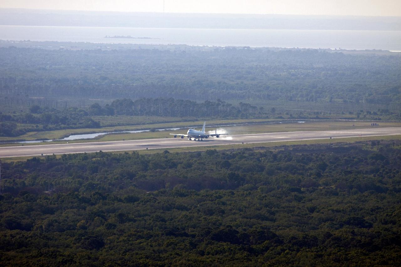 CAPE CANAVERAL, Fla. – The Shuttle Carrier Aircraft makes contact with the runway at the Shuttle Landing Facility at NASA’s Kennedy Space Center in Florida.    The aircraft, known as an SCA, arrived at 5:35 p.m. EDT to prepare for shuttle Discovery’s ferry flight to the Washington Dulles International Airport in Sterling, Va., on April 17. This SCA, designated NASA 905, is a modified Boeing 747 jet airliner, originally manufactured for commercial use. One of two SCAs employed over the course of the Space Shuttle Program, NASA 905 is assigned to the remaining ferry missions, delivering the shuttles to their permanent public display sites.  NASA 911 was decommissioned at the NASA Dryden Flight Research Center in California in February. Discovery will be placed on permanent public display in the Smithsonian's National Air and Space Museum Steven F. Udvar-Hazy Center in Chantilly, Va.  For more information on the SCA, visit http://www.nasa.gov/centers/dryden/news/FactSheets/FS-013-DFRC.html. For more information on shuttle transition and retirement activities, visit http://www.nasa.gov/shuttle. Photo credit: NASA/Jim Grossmann