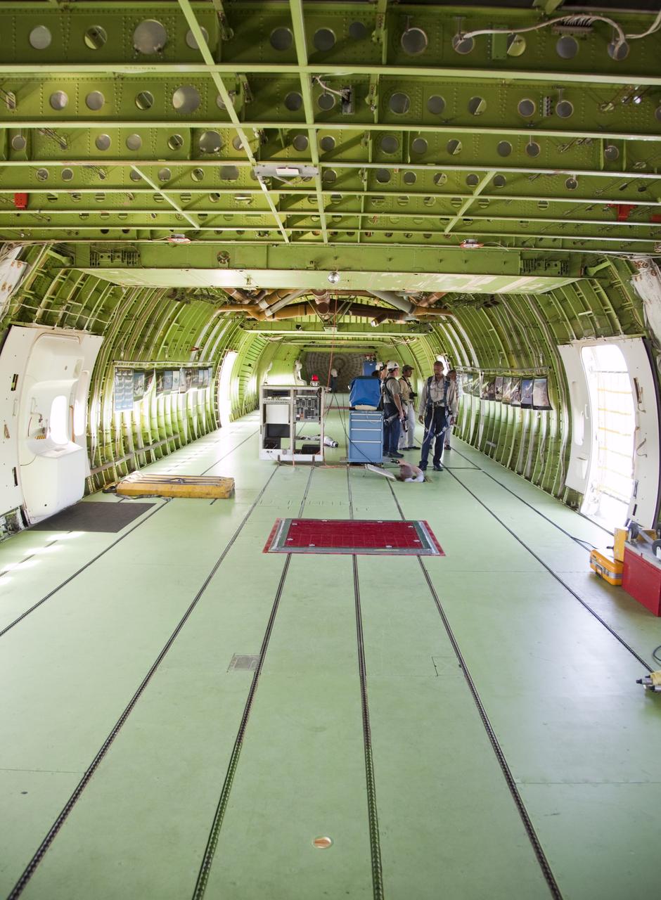 CAPE CANAVERAL, Fla. – At NASA’s Kennedy Space Center in Florida, maintenance technicians from NASA’s Dryden Flight Research Center in California check equipment inside NASA’s Shuttle Carrier Aircraft modified 747 jet, or SCA, after arriving at the Shuttle Landing Facility from Edwards Air Force Base in California.     During the Space Shuttle Program’s transition and retirement processing, Discovery was prepared for display at Smithsonian’s National Air and Space Museum, Steven F. Udvar-Hazy Center in Chantilly, Va. Discovery is scheduled to be transported atop the SCA, designated NASA 905, to Dulles International Airport in Virginia on April 17 and then moved to the Smithsonian for permanent public display on April 19. The SCA is assigned to the remaining ferry missions, delivering the shuttles to their permanent public display sites. For more information, visit http://www.nasa.gov/shuttle.  Photo credit: NASA/Frankie Martin