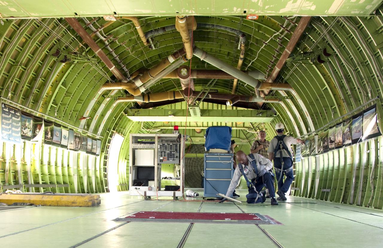 CAPE CANAVERAL, Fla. – At NASA’s Kennedy Space Center in Florida, maintenance technicians from NASA’s Dryden Flight Research Center in California check equipment inside NASA’s Shuttle Carrier Aircraft modified 747 jet, or SCA, after arriving at the Shuttle Landing Facility from Edwards Air Force Base in California.     During the Space Shuttle Program’s transition and retirement processing, Discovery was prepared for display at Smithsonian’s National Air and Space Museum, Steven F. Udvar-Hazy Center in Chantilly, Va. Discovery is scheduled to be transported atop the SCA, designated NASA 905, to Dulles International Airport in Virginia on April 17 and then moved to the Smithsonian for permanent public display on April 19. The SCA is assigned to the remaining ferry missions, delivering the shuttles to their permanent public display sites. For more information, visit http://www.nasa.gov/shuttle.  Photo credit: NASA/Frankie Martin