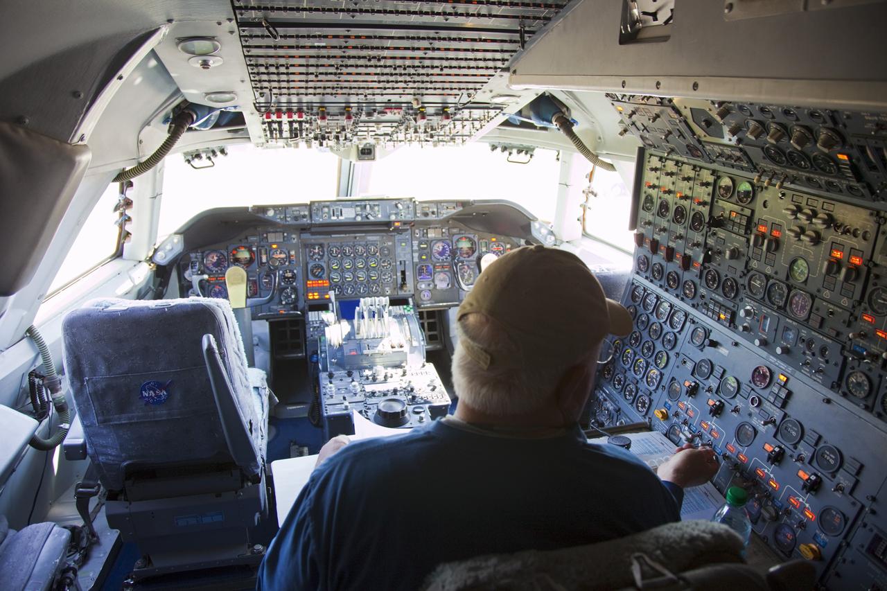 CAPE CANAVERAL, Fla. – At NASA’s Kennedy Space Center in Florida, a maintenance technician from NASA’s Dryden Flight Research Center in California checks controls inside NASA’s Shuttle Carrier Aircraft modified 747 jet, or SCA, after arriving at the Shuttle Landing Facility from Edwards Air Force Base in California.      During the Space Shuttle Program’s transition and retirement processing, Discovery was prepared for display at Smithsonian’s National Air and Space Museum, Steven F. Udvar-Hazy Center in Chantilly, Va. Discovery is scheduled to be transported atop the SCA, designated NASA 905, to Dulles International Airport in Virginia on April 17 and then moved to the Smithsonian for permanent public display on April 19. The SCA is assigned to the remaining ferry missions, delivering the shuttles to their permanent public display sites. For more information, visit http://www.nasa.gov/shuttle.  Photo credit: NASA/Frankie Martin