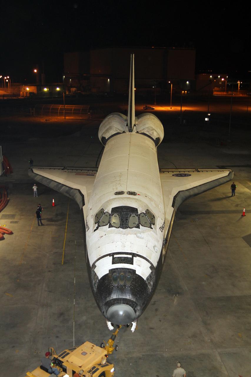CAPE CANAVERAL, Fla. – Space shuttle Discovery backs out of the Vehicle Assembly Building, or VAB, at NASA’s Kennedy Space Center in Florida, for its trip to the Shuttle Landing Facility, or SLF. Discovery was in storage in the VAB’s high bay 4 awaiting departure from Kennedy’s Launch Complex 39 area for the final time. At the SLF, Discovery will be hoisted onto a Shuttle Carrier Aircraft, or SCA, with the aid of a mate-demate device. The SCA, a modified Boeing 747 jet airliner, is scheduled to transport Discovery to the Washington Dulles International Airport in Virginia on April 17, after which the shuttle will be placed on permanent public display in the Smithsonian's National Air and Space Museum Steven F. Udvar-Hazy Center. For more information on shuttle transition and retirement activities, visit http://www.nasa.gov/transition. Photo credit: NASA/Kim Shiflett