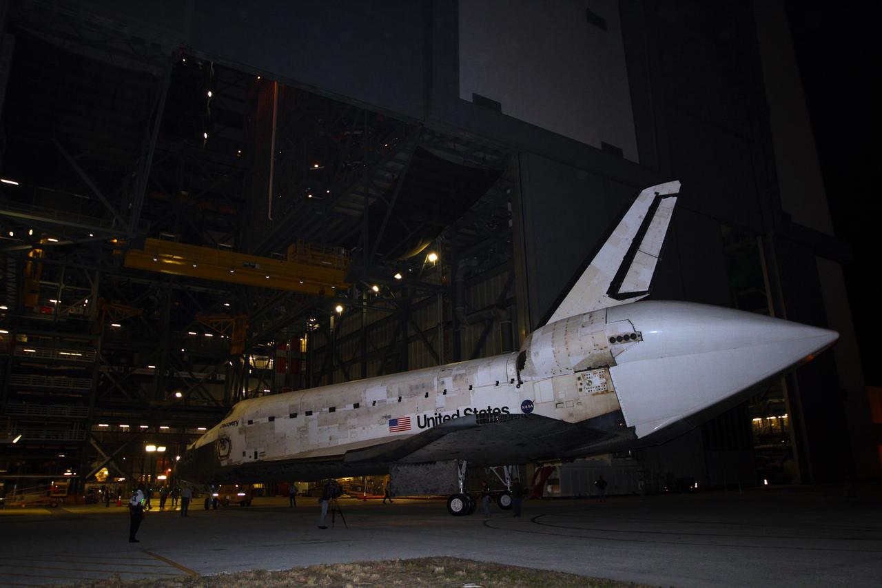 CAPE CANAVERAL, Fla. – Space shuttle Discovery rolls out of the Vehicle Assembly Building, or VAB, at NASA’s Kennedy Space Center in Florida, into darkness for its trip to the Shuttle Landing Facility, or SLF. Its move got under way at 5 a.m. EDT. A tail cone has been installed over its three replica shuttle main engines to reduce aerodynamic drag and turbulence during its upcoming ferry flight. Discovery was in storage in the VAB’s high bay 4 awaiting departure from Kennedy’s Launch Complex 39 area for the final time. At the SLF, Discovery will be hoisted onto a Shuttle Carrier Aircraft, or SCA, with the aid of a mate-demate device. The SCA, a modified Boeing 747 jet airliner, is scheduled to transport Discovery to the Washington Dulles International Airport in Virginia on April 17, after which the shuttle will be placed on permanent public display in the Smithsonian's National Air and Space Museum Steven F. Udvar-Hazy Center. For more information on shuttle transition and retirement activities, visit http://www.nasa.gov/transition. Photo credit: NASA/Kim Shiflett