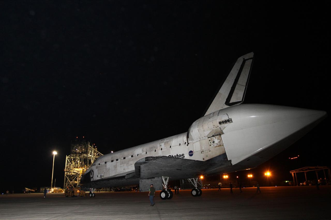 CAPE CANAVERAL, Fla. – Space shuttle Discovery approaches the mate-demate device, or MDD, at the Shuttle Landing Facility at NASA’s Kennedy Space Center in Florida.  A tail cone has been installed over its three replica shuttle main engines to reduce aerodynamic drag and turbulence during its upcoming ferry flight.    The MDD is a large gantry-like steel structure used to hoist a shuttle off the ground and position it onto the back of a Shuttle Carrier Aircraft, or SCA. The SCA is a Boeing 747 jet, originally manufactured for commercial use, which was modified by NASA to transport the shuttles between destinations on Earth.  The SCA designated NASA 905 is assigned to the remaining ferry missions, delivering the shuttles to their permanent public display sites.  Discovery’s new home will be the Smithsonian's National Air and Space Museum Steven F. Udvar-Hazy Center in Chantilly, Va.  For more information on the SCA, visit http://www.nasa.gov/centers/dryden/news/FactSheets/FS-013-DFRC.html. For more information on shuttle transition and retirement activities, visit http://www.nasa.gov/transition. Photo credit: NASA/Kim Shiflett