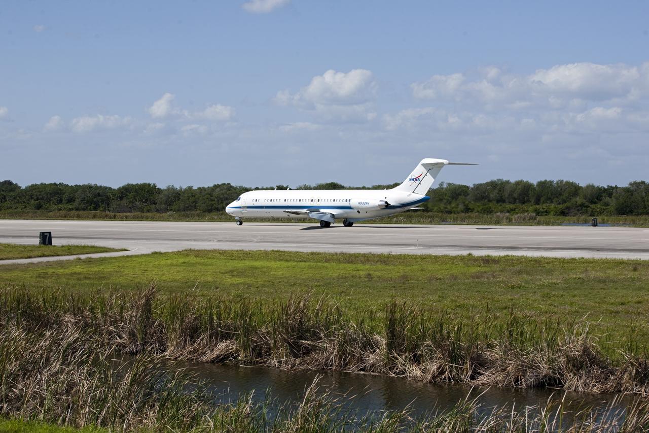CAPE CANAVERAL, Fla. – The “pathfinder” aircraft for space shuttle Discovery’s ferry flight taxis down the runway at the Shuttle Landing Facility at NASA’s Kennedy Space Center in Florida. The NASA C-9 aircraft will fly about 100 miles ahead of Discovery to scout for the safest route between destinations. Its crew includes an SCA flight engineer who studies the weather patterns along the flight path to find a route free of rain and other turbulence. The carrier aircraft, also known as an SCA, is a Boeing 747 jet, originally manufactured for commercial use which was modified by NASA to transport the shuttles between destinations on Earth. NASA 905 is scheduled to ferry Discovery to the Washington Dulles International Airport in Virginia on April 17, and is assigned to all remaining ferry missions, delivering the shuttles to their permanent public display sites. After its arrival at Dulles, Discovery will be placed on display in the Smithsonian's National Air and Space Museum Steven F. Udvar-Hazy Center on April 19. For more information on the SCA, visit http://www.nasa.gov/centers/dryden/news/FactSheets/FS-013-DFRC.html. For more information on shuttle transition and retirement activities, visit http://www.nasa.gov/transition. Photo credit: NASA/Amanda Diller