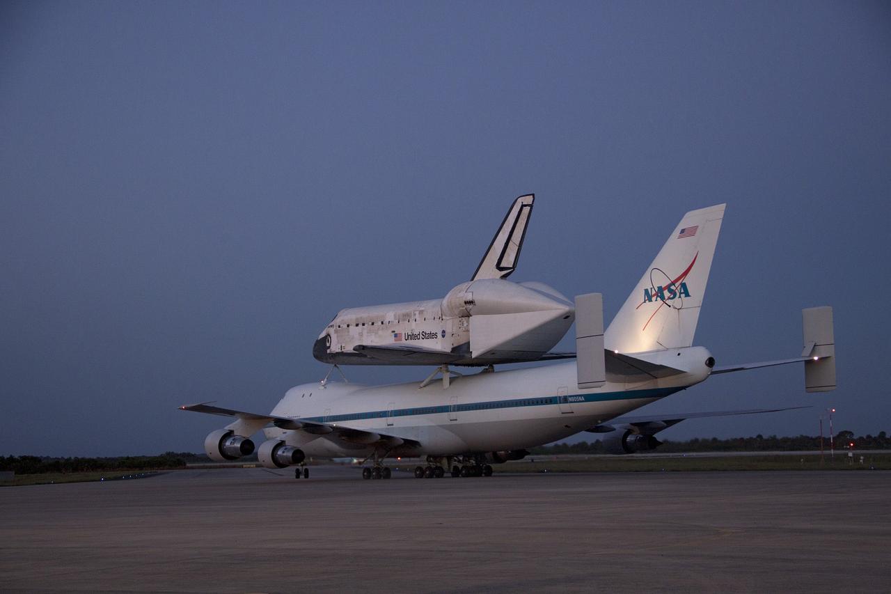 CAPE CANAVERAL, Fla. – The Shuttle Carrier Aircraft transporting space shuttle Discovery to its new home is ready for takeoff from the Shuttle Landing Facility at NASA’s Kennedy Space Center in Florida at about 7 a.m. EDT. The aircraft, known as an SCA, is a Boeing 747 jet, originally manufactured for commercial use, which was modified by NASA to transport the shuttles between destinations on Earth. This SCA, designated NASA 905, is assigned to the remaining ferry missions, delivering the shuttles to their permanent public display sites. NASA 905 is scheduled to ferry Discovery to the Washington Dulles International Airport in Virginia on April 17, after which the shuttle will be placed on display in the Smithsonian's National Air and Space Museum Steven F. Udvar-Hazy Center. For more information on the SCA, visit http://www.nasa.gov/centers/dryden/news/FactSheets/FS-013-DFRC.html. For more information on shuttle transition and retirement activities, visit http://www.nasa.gov/transition. Photo credit: NASA/Jim Grossmann