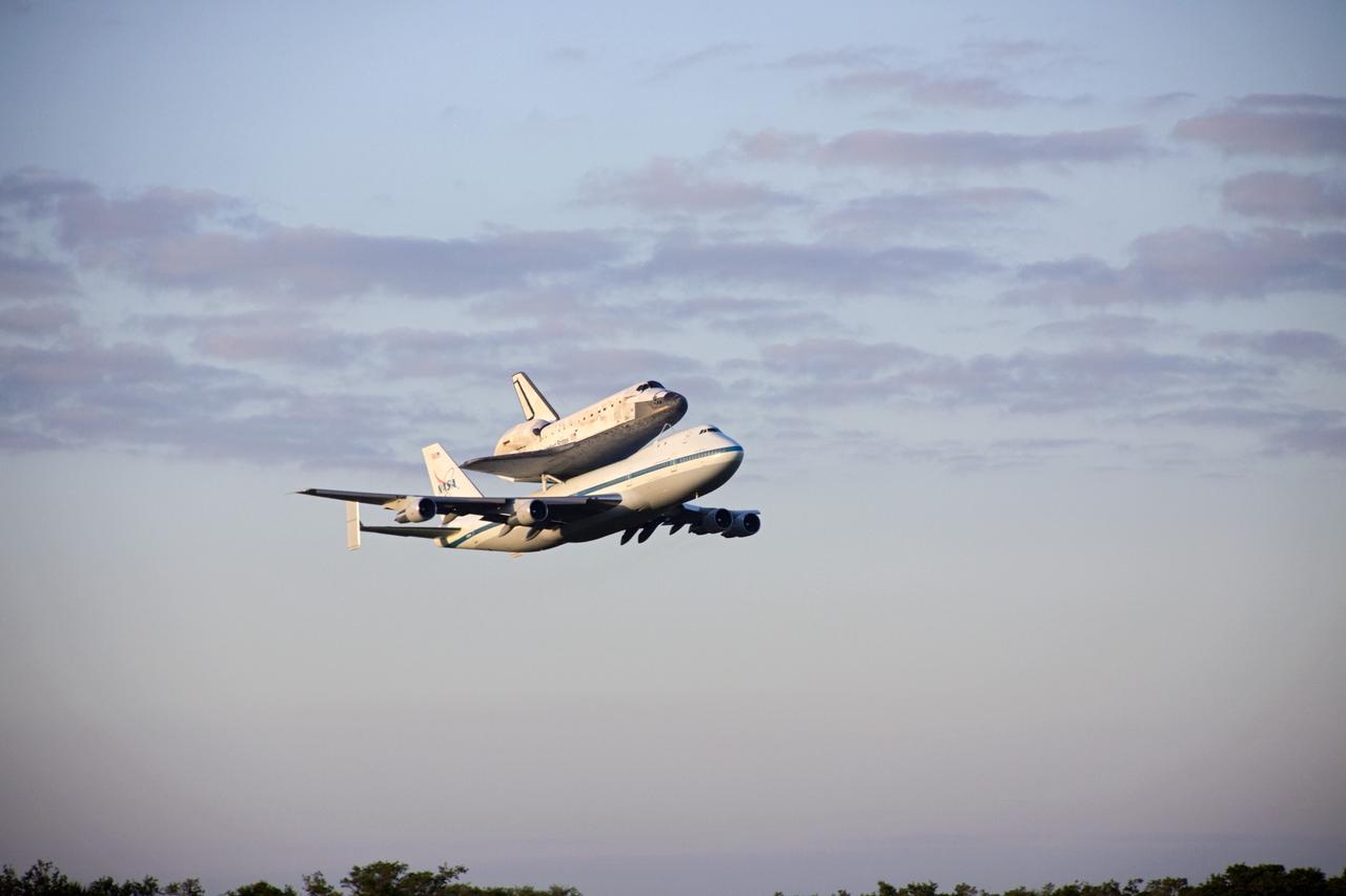 CAPE CANAVERAL, Fla. – Space shuttle Discovery, mounted to a Shuttle Carrier Aircraft, takes off from the Shuttle Landing Facility at NASA's Kennedy Space Center in Florida. The duo is beginning their 3 1/2 hour ferry flight to the Washington Dulles International Airport in Virginia. Discovery is leaving Kennedy after more than 28 years of service beginning with its arrival on the space coast Nov. 9, 1983. Discovery first launched to space Aug. 30, 1984, on the STS-41D mission. Discovery is the agency's most-flown shuttle with 39 missions, more than 148 million miles and a total of one year in space. Discovery is set to move to the Smithsonian's National Air and Space Museum Steven F. Udvar-Hazy Center on April 19 where it will be placed on public display. For more information on the SCA, visit http://www.nasa.gov/centers/dryden/news/FactSheets/FS-013-DFRC.html. For more information on shuttle transition and retirement activities, visit http://www.nasa.gov/transition. Photo credit: NASA/Jim Grossmann