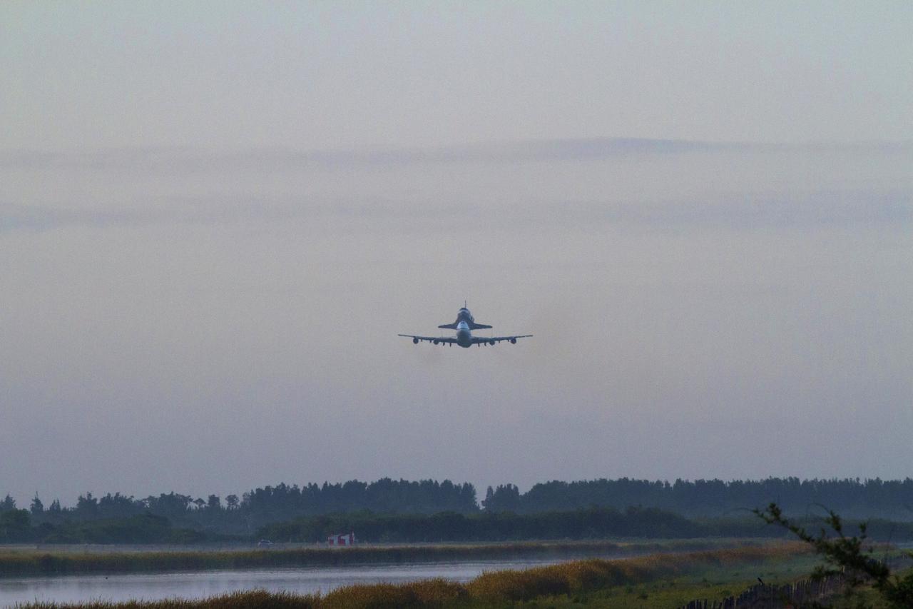 CAPE CANAVERAL, Fla. – Space shuttle Discovery, mounted to a Shuttle Carrier Aircraft, or SCA, takes off from NASA Kennedy Space Center’s Shuttle Landing Facility runway 15 in Florida at 7 a.m. EDT. The duo is beginning its ferry flight to the Washington Dulles International Airport in Virginia that also includes a flyby of the Space Coast and Washington, D.C. Discovery is leaving Kennedy after more than 28 years of service beginning with its arrival on the space coast Nov. 9, 1983. Discovery first launched to space Aug. 30, 1984, on the STS-41D mission. Discovery is the agency’s most-flown shuttle with 39 missions, more than 148 million miles and a total of one year in space. Discovery is set to move to the Smithsonian’s National Air and Space Museum, Steven F. Udvar-Hazy Center in Chantilly, Va., on April 19 where it will be place on public display. For more information on the SCA, visit http://www.nasa.gov/centers/dryden/news/FactSheets/FS-013-DFRC.html. For more information on shuttle transition and retirement activities, visit http://www.nasa.gov/transition. Photo credit: NASA/Tim Powers and Rick Wetherington