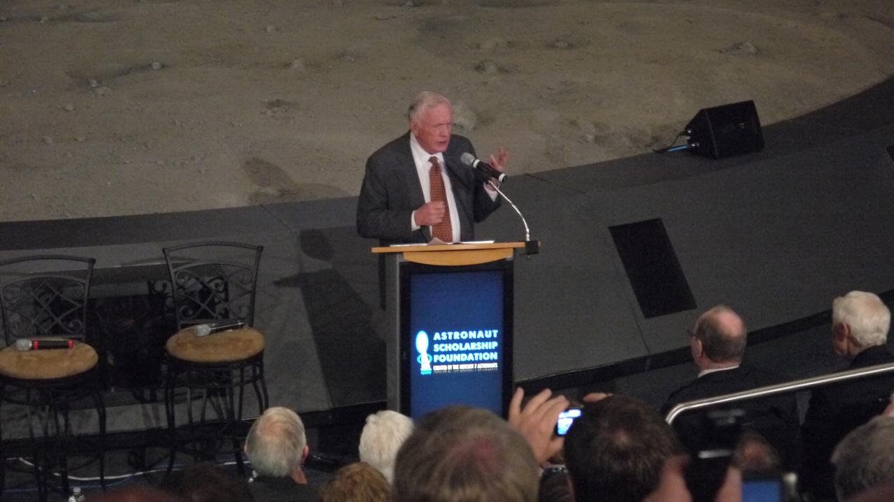 CAPE CANAVERAL, Fla. -- Apollo 11 Commander Neil Armstrong addresses the audience at the 40th anniversary celebration of Apollo 16's lunar landing, which occurred April 20, 1972. The Astronaut Scholarship Foundation hosted the soiree at the Kennedy Space Center Visitor Complex's Saturn V Center. The 11-day Apollo 16 mission featured three moonwalks, including a nearly 17-mile lunar rover road trip to collect more than 200 pounds of moon rocks to return to Earth. Photo credit: NASA/Chris Chamberland