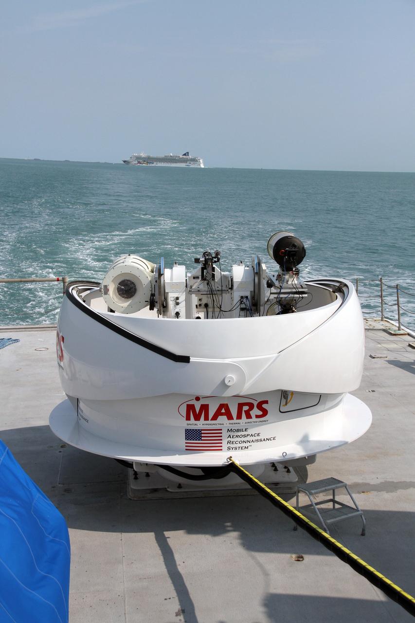 CAPE CANAVERAL, Fla. – NASA’s Freedom Star boat sets out for a day of testing after departing through Port Canaveral in Florida for the Atlantic Ocean with NASA’s Mobile Aerospace Reconnaissance System, or MARS, secured aboard.     MARS, run by NASA’s Langley Research Center in Hampton, Va., with its spatial, hyperspectral, thermal, and directed energy capabilities will be used for thermal imaging testing for the upcoming SpaceX Falcon 9 and Dragon capsule test flight to the International Space Station. During today’s test, the MARS X-band radar and kineto tracking mount KTM were tested to ensure that they were synchronized to receive a rocket launch feed. The radar was used to identify an object to see if the KTM could lock on to and track it. The MARS team performed maintenance on the system, confirmed communications links, and tested the design of the mounting system and environmental enclosure. Photo credit: NASA/Cory Huston