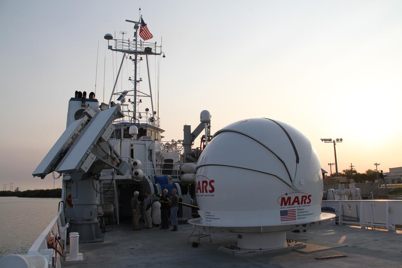 CAPE CANAVERAL, Fla. – NASA’s Freedom Star boat is heading back to Port Canaveral in Florida, after a full day of testing NASA’s Mobile Aerospace Reconnaissance System, or MARS, in the Atlantic Ocean.      MARS, run by NASA’s Langley Research Center in Hampton, Va., with its spatial, hyperspectral, thermal, and directed energy capabilities will be used for thermal imaging testing for the upcoming SpaceX Falcon 9 and Dragon capsule test flight to the International Space Station. During today’s test, the MARS X-band radar and kineto tracking mount KTM were tested to ensure that they were synchronized to receive a rocket launch feed. The radar was used to identify an object to see if the KTM could lock on to and track it. The MARS team performed maintenance on the system, confirmed communications links, and tested the design of the mounting system and environmental enclosure. Photo credit: NASA/Cory Huston