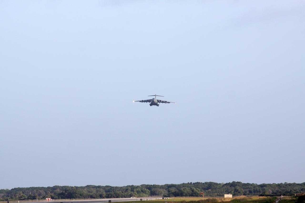 CAPE CANAVERAL, Fla. – A U.S. Air Force C-17 cargo aircraft approaches the Shuttle Landing Facility at NASA’s Kennedy Space Center in Florida. Aboard are NASA's twin Radiation Belt Storm Probes. The RBSP mission will help us understand the sun’s influence on Earth and near-Earth space by studying the Earth’s radiation belts on various scales of space and time. The RBSP instruments will provide the measurements needed to characterize and quantify the plasma processes that produce very energetic ions and relativistic electrons. The mission is part of NASA’s broader Living With a Star Program that was conceived to explore fundamental processes that operate throughout the solar system, and in particular those that generate hazardous space weather effects in the vicinity of Earth and phenomena that could impact solar system exploration. RBSP is scheduled to begin its mission of exploration of Earth's Van Allen Radiation Belts and the extremes of space weather after launch. Launch aboard a United Launch Alliance Atlas V rocket is scheduled for August 23. For more information, visit http://www.nasa.gov/rbsp. Photo credit: NASA/Kim Shiflett