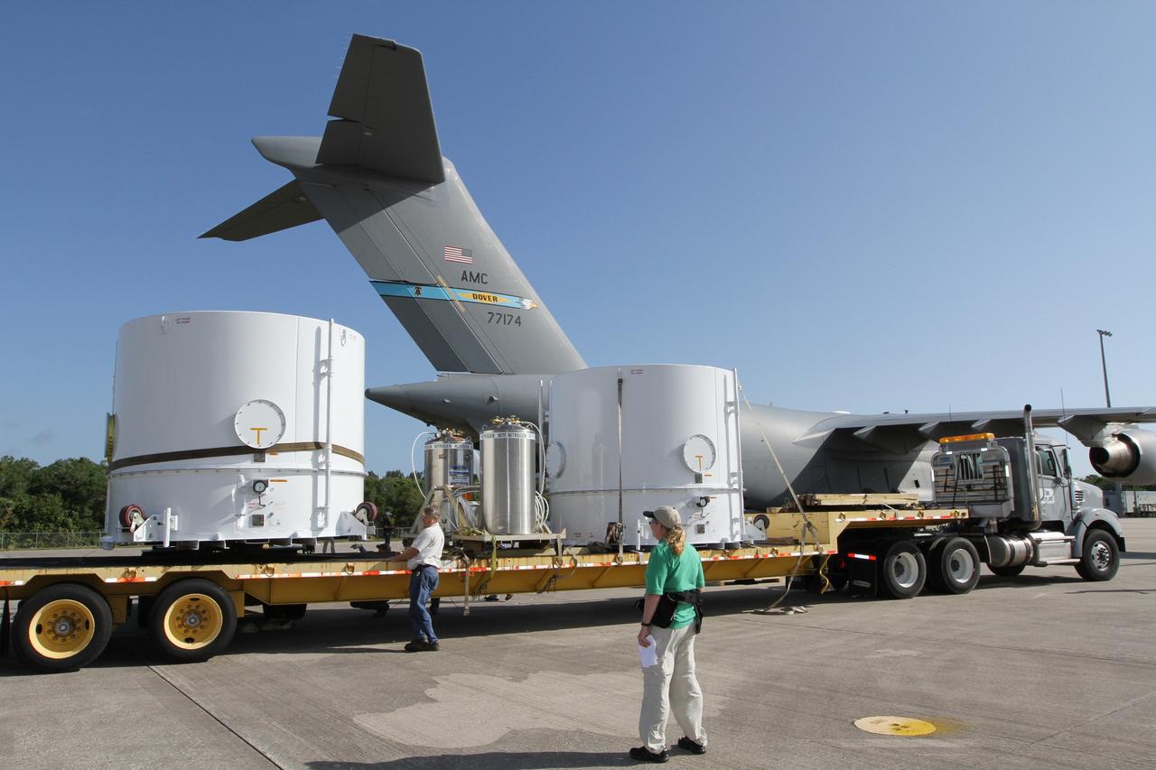 CAPE CANAVERAL, Fla. – Workers position NASA's Radiation Belt Storm Probe A, enclosed in a protective shipping container, onto a flatbed truck at the Shuttle Landing Facility at NASA’s Kennedy Space Center in Florida.  The twin RBSP spacecraft will be transported to the Astrotech payload processing facility near Kennedy Space Center where Applied Physics Laboratory technicians will begin spacecraft testing and prelaunch preparations. Nitrogen will be pumped into the canisters during transport to provide the proper environmental control for the spacecraft.            The RBSP mission will help us understand the sun’s influence on Earth and near-Earth space by studying the Earth’s radiation belts on various scales of space and time. The RBSP instruments will provide the measurements needed to characterize and quantify the plasma processes that produce very energetic ions and relativistic electrons. The mission is part of NASA’s broader Living With a Star Program that was conceived to explore fundamental processes that operate throughout the solar system, and in particular those that generate hazardous space weather effects in the vicinity of Earth and phenomena that could impact solar system exploration. RBSP is scheduled to begin its mission of exploration of Earth's Van Allen Radiation Belts and the extremes of space weather after launch. Launch aboard a United Launch Alliance Atlas V rocket is scheduled for August 23.  For more information, visit http://www.nasa.gov/rbsp.  Photo credit: NASA/Kim Shiflett