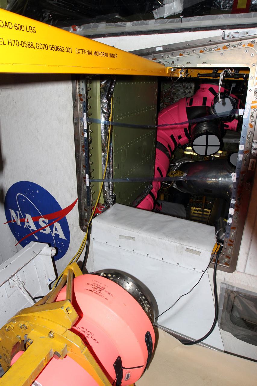 CAPE CANAVERAL, Fla. – In Orbiter Processing Facility-1 at NASA’s Kennedy Space Center in Florida, the first of three fuel lines that supplied liquid hydrogen propellant to space shuttle Atlantis’ main engines is disconnected from the shuttle. The liquid hydrogen lines will be placed in storage to preserve the option to reuse them on NASA’s Space Launch System heavy-lift vehicle, under development. The work is part of the Space Shuttle Program’s transition and retirement processing of shuttle Atlantis. A groundbreaking was held Jan. 18 for Atlantis' future home, a 65,000-square-foot exhibit hall in Shuttle Plaza at the Kennedy Space Center Visitor Complex. Atlantis is scheduled to roll over to the visitor complex in November in preparation for the exhibit’s grand opening in July 2013. For more information, visit http://www.nasa.gov/shuttle. Photo credit: NASA/Ben Smegelsky