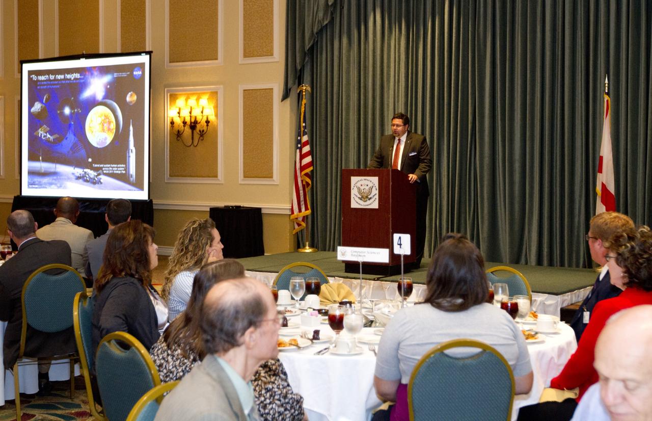 COCOA BEACH, Fla.. -- Todd May, program manager of the Space Launch System, addresses the National Space Club's Florida Committee during the organization's monthly luncheon in Cocoa Beach, Fla. May, who works at NASA's Marshall Space Flight Center in Huntsville, Ala., discussed the status of the SLS program. Photo credit: NASA/Kim Shiflett
