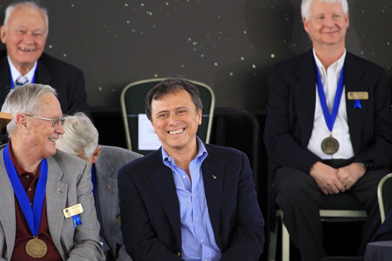 CAPE CANAVERAL, Fla. – At NASA’s Kennedy Space Center Visitor Complex in Florida, space shuttle astronaut and U.S. Astronaut Hall of Fame Class of 2012 inductee Franklin Chang Diaz at right shares a humorous moment with Astronaut Scholarship Foundation Chairman and Hall of Fame astronaut Charlie Duke during the induction ceremony. Shuttle astronauts Kevin Chilton and Charlie Precourt also were inducted into the Hall of Fame.    The year’s inductees were selected by a committee of current Hall of Fame astronauts, former NASA officials, historians and journalists. The selection process is administered by the Astronaut Scholarship Foundation. Photo credit: NASA/Jim Grossmann