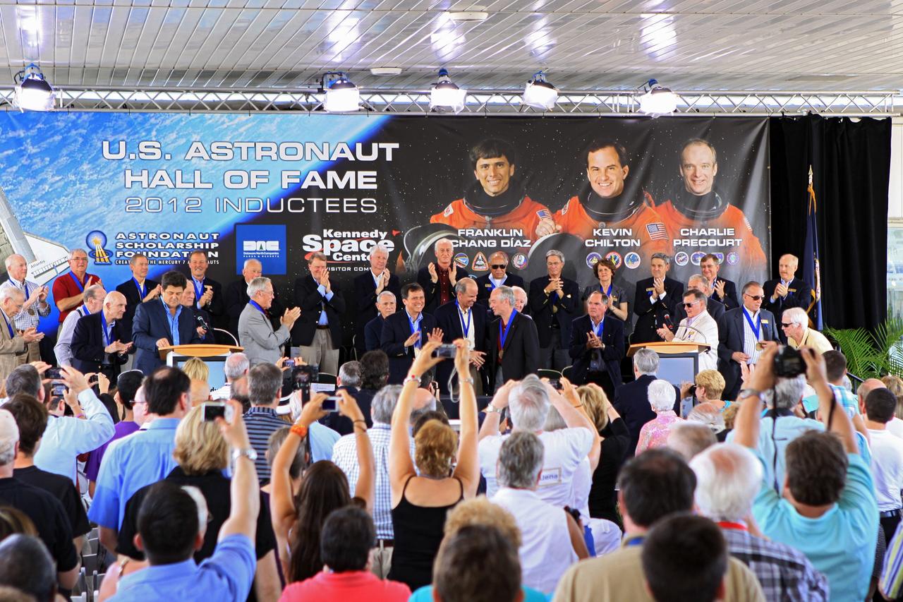 CAPE CANAVERAL, Fla. – At NASA’s Kennedy Space Center Visitor Complex in Florida, shuttle astronauts Franklin Chang Diaz, at left, Kevin Chilton and Charlie Precourt stand together after being inducted into the U.S. Astronaut Hall of Fame Class of 2012.    The year’s inductees were selected by a committee of current Hall of Fame astronauts, former NASA officials, historians and journalists. The selection process is administered by the Astronaut Scholarship Foundation. Photo credit: NASA/Jim Grossmann