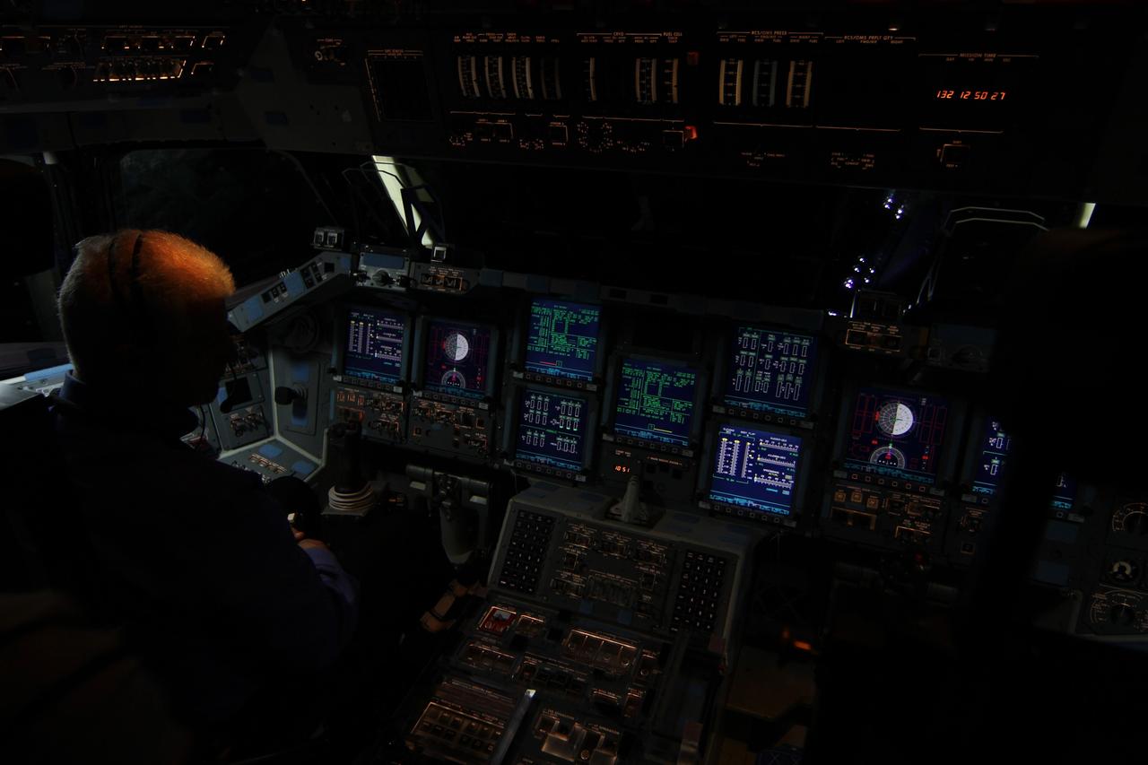 CAPE CANAVERAL, Fla. – In Orbiter Processing Facility-2 at NASA’s Kennedy Space Center in Florida, United Space Alliance manager Walter “Buddy” McKenzie monitors the consoles on space shuttle Endeavour’s flight deck as operations to power down the shuttle for the final time get under way. Endeavour is being prepared for public display at the California Science Center in Los Angeles. Its ferry flight to California is targeted for mid-September. Endeavour was the last space shuttle added to NASA’s orbiter fleet. Over the course of its 19-year career, Endeavour spent 299 days in space during 25 missions. For more information, visit http://www.nasa.gov/transition. Photo credit: NASA/Ben Smegelsky