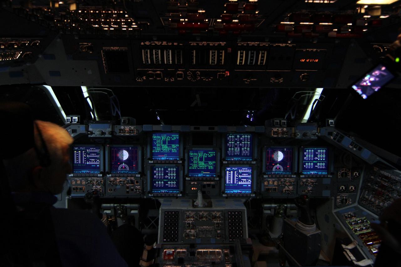 CAPE CANAVERAL, Fla. – In Orbiter Processing Facility-2 at NASA’s Kennedy Space Center in Florida, United Space Alliance manager Walter “Buddy” McKenzie monitors the consoles on space shuttle Endeavour’s flight deck as operations to power down the shuttle for the final time get under way. Endeavour is being prepared for public display at the California Science Center in Los Angeles. Its ferry flight to California is targeted for mid-September. Endeavour was the last space shuttle added to NASA’s orbiter fleet. Over the course of its 19-year career, Endeavour spent 299 days in space during 25 missions. For more information, visit http://www.nasa.gov/transition. Photo credit: NASA/Ben Smegelsky