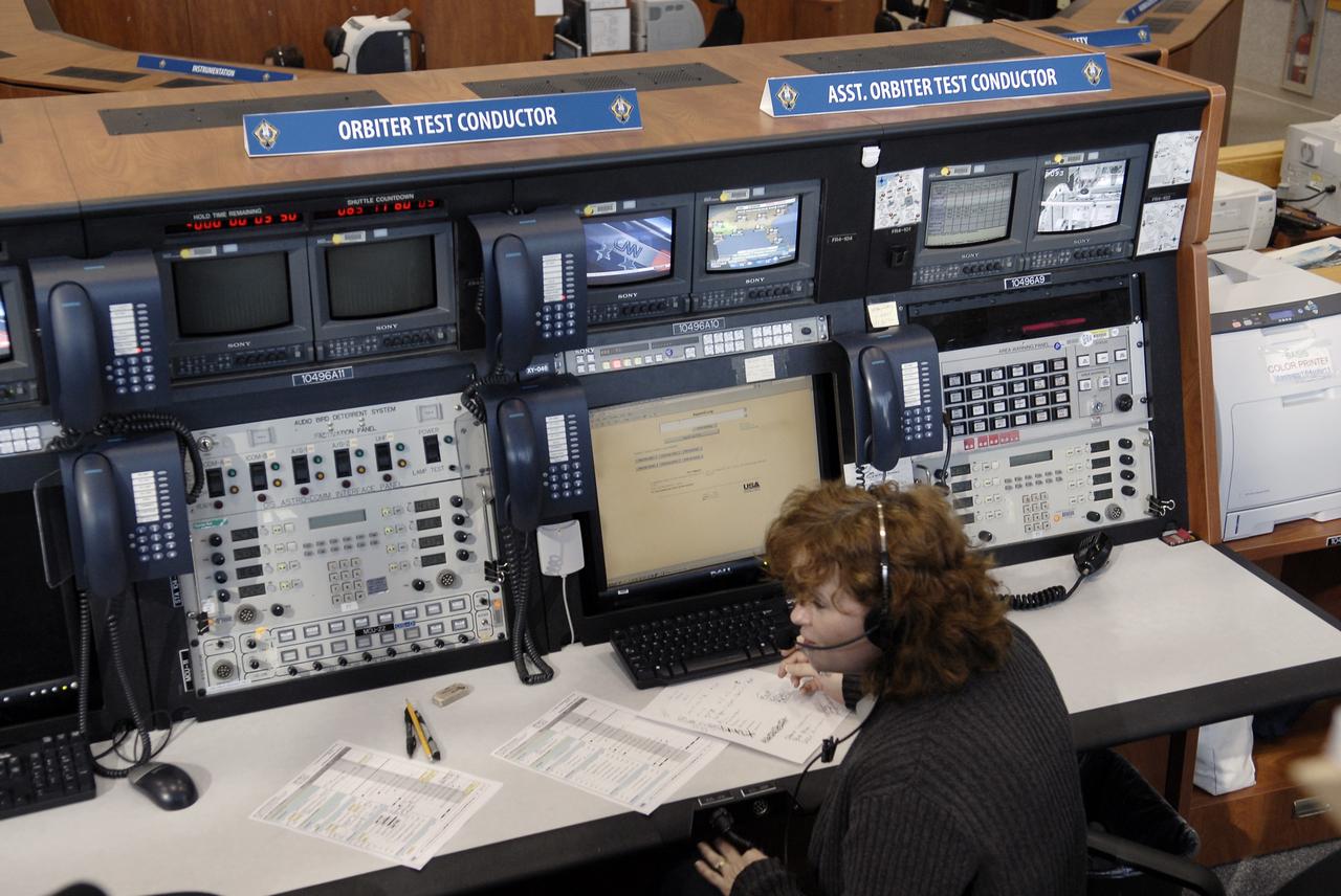 CAPE CANAVERAL, Fla. – United Space Alliance orbiter test conductor Lauren Sally is on station at her Firing Room 4 console in the Launch Control Center as operations to power down space shuttle Endeavour for the final time are under way in Orbiter Processing Facility-2 at NASA’s Kennedy Space Center in Florida. Endeavour is being prepared for public display at the California Science Center in Los Angeles. Its ferry flight to California is targeted for mid-September. Endeavour was the last space shuttle added to NASA’s orbiter fleet. Over the course of its 19-year career, Endeavour spent 299 days in space during 25 missions. For more information, visit http://www.nasa.gov/transition. Photo credit: NASA/Tim Jacobs