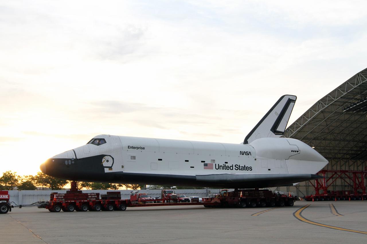 NEW YORK – Space shuttle Enterprise is rolled into a protective hangar at John F. Kennedy International Airport in New York City. Enterprise, a prototype built to test aspects of the space shuttle design, will be displayed at the Intrepid Sea, Air and Space Museum in New York. Photo credit: NASA/Kim Shiflett