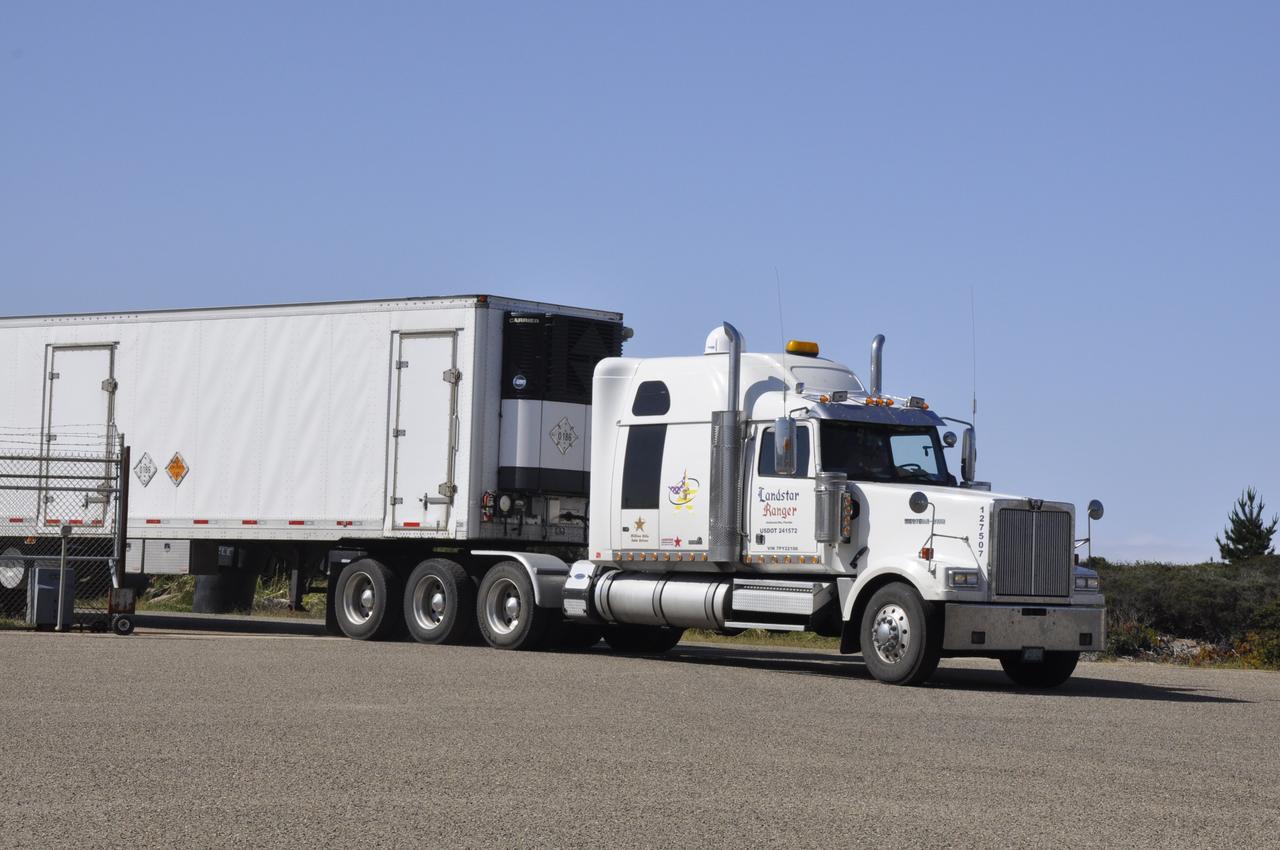 Vandenberg Air Force Base, Calif. – A truck carrying all three stages of the Orbital Sciences Pegasus XL rocket arrives at Vandenberg Air Force Base in California.      NASA’s Interface Region Imaging Spectrograph, or IRIS, spacecraft will launch aboard the Pegasus XL in late 2012. IRIS will open a new window of discovery by tracing the flow of energy and plasma through the chromospheres and transition region into the sun’s corona using spectrometry and imaging.  IRIS fills a crucial gap in our ability to advance studies of the sun-to-Earth connection by tracing the flow of energy and plasma through the foundation of the corona and heliosphere, or region around the sun. Photo credit: NASA/Randy Beaudoin