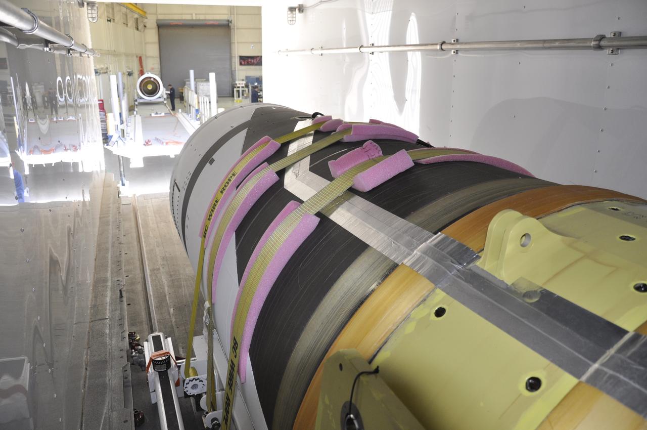 Vandenberg Air Force Base, Calif. – At Vandenberg Air Force Base in California, technicians prepare to offload the first stage of the Orbital Sciences Pegasus XL rocket from the truck in which it was transported.      NASA’s Interface Region Imaging Spectrograph, or IRIS, spacecraft will launch aboard the Pegasus XL in late 2012. IRIS will open a new window of discovery by tracing the flow of energy and plasma through the chromospheres and transition region into the sun’s corona using spectrometry and imaging.  IRIS fills a crucial gap in our ability to advance studies of the sun-to-Earth connection by tracing the flow of energy and plasma through the foundation of the corona and heliosphere, or region around the sun. Photo credit: NASA/Randy Beaudoin