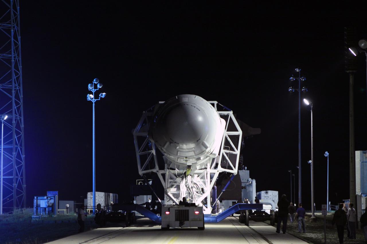 CAPE CANAVERAL, Fla. – The SpaceX Falcon 9 rocket makes its way to the pad at Space Launch Complex-40 on Cape Canaveral Air Force Station in Florida.    Liftoff with the SpaceX Dragon capsule aboard is set for 4:55 a.m. EDT on May 19. The launch will be the company's second demonstration test flight for NASA's Commercial Orbital Transportation Services Program, or COTS. During the flight, the capsule will conduct a series of check-out procedures to test and prove its systems, including rendezvous and berthing with the International Space Station. If the capsule performs as planned, the cargo and experiments it is carrying will be transferred to the station. The cargo includes food, water and provisions for the station’s Expedition crews, such as clothing, batteries and computer equipment. Under COTS, NASA has partnered with two aerospace companies to deliver cargo to the station. For more information, visit http://www.nasa.gov/spacex.  Photo credit: NASA/Jim Grossmann