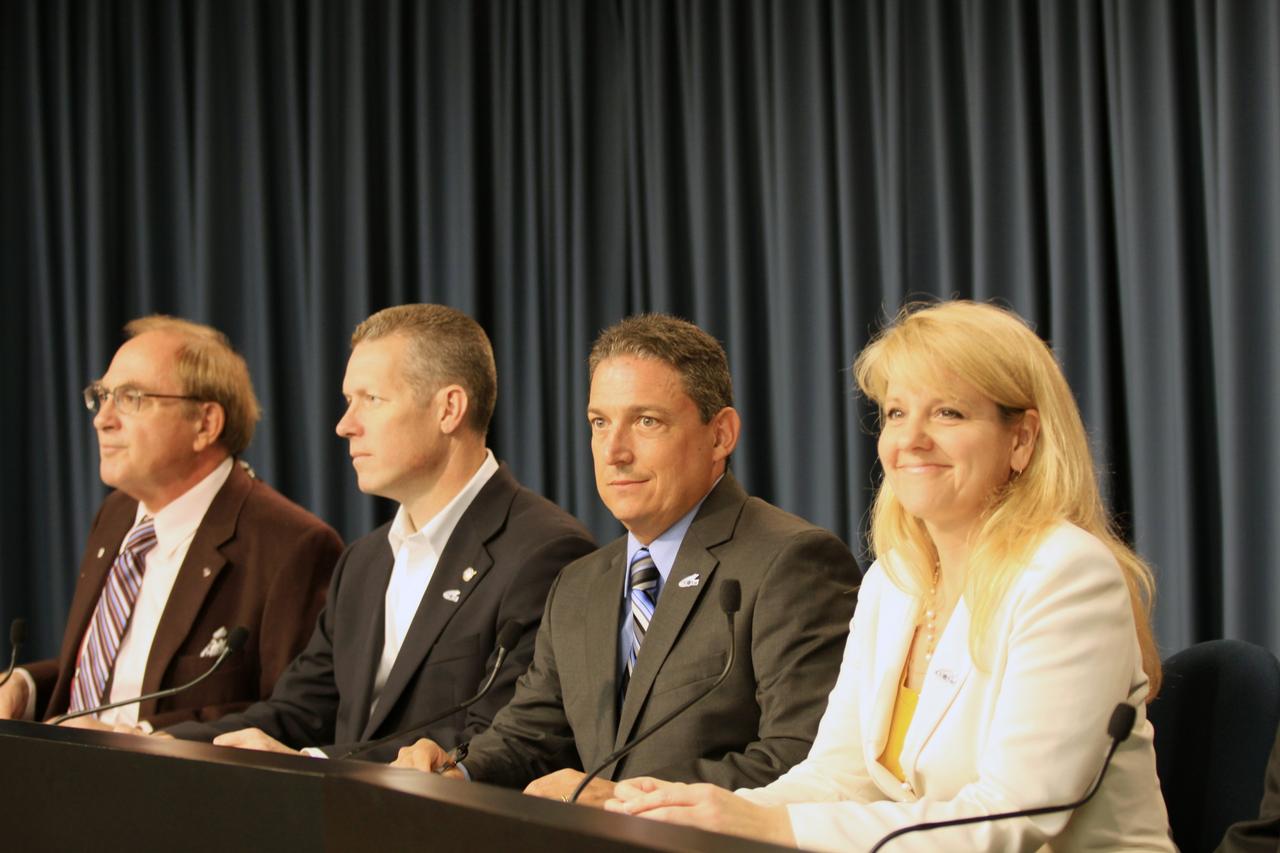 CAPE CANAVERAL, Fla. – Participating in a prelaunch news conference in the Press Site Auditorium at NASA’s Kennedy Space Center in Florida are, from left, George H. Diller, NASA Public Affairs, Phil McAlister, director, NASA Commercial Spaceflight Development, Alan Lindenmoyer, manager, NASA Commercial Crew and Cargo Program, and Gwynne Shotwell, president, SpaceX.    Liftoff of the SpaceX Falcon 9 rocket carrying a Dragon capsule to orbit is set for 4:55 a.m. EDT on May 19. The launch will be the company's second demonstration test flight for NASA's Commercial Orbital Transportation Services Program, or COTS. During the flight, the capsule will conduct a series of check-out procedures to test and prove its systems, including rendezvous and berthing with the International Space Station. If the capsule performs as planned, the cargo and experiments it is carrying will be transferred to the station. The cargo includes food, water and provisions for the station’s Expedition crews, such as clothing, batteries and computer equipment. Under COTS, NASA has partnered with two aerospace companies to deliver cargo to the station. For more information, visit http://www.nasa.gov/spacex.  Photo credit: NASA/Jim Grossmann