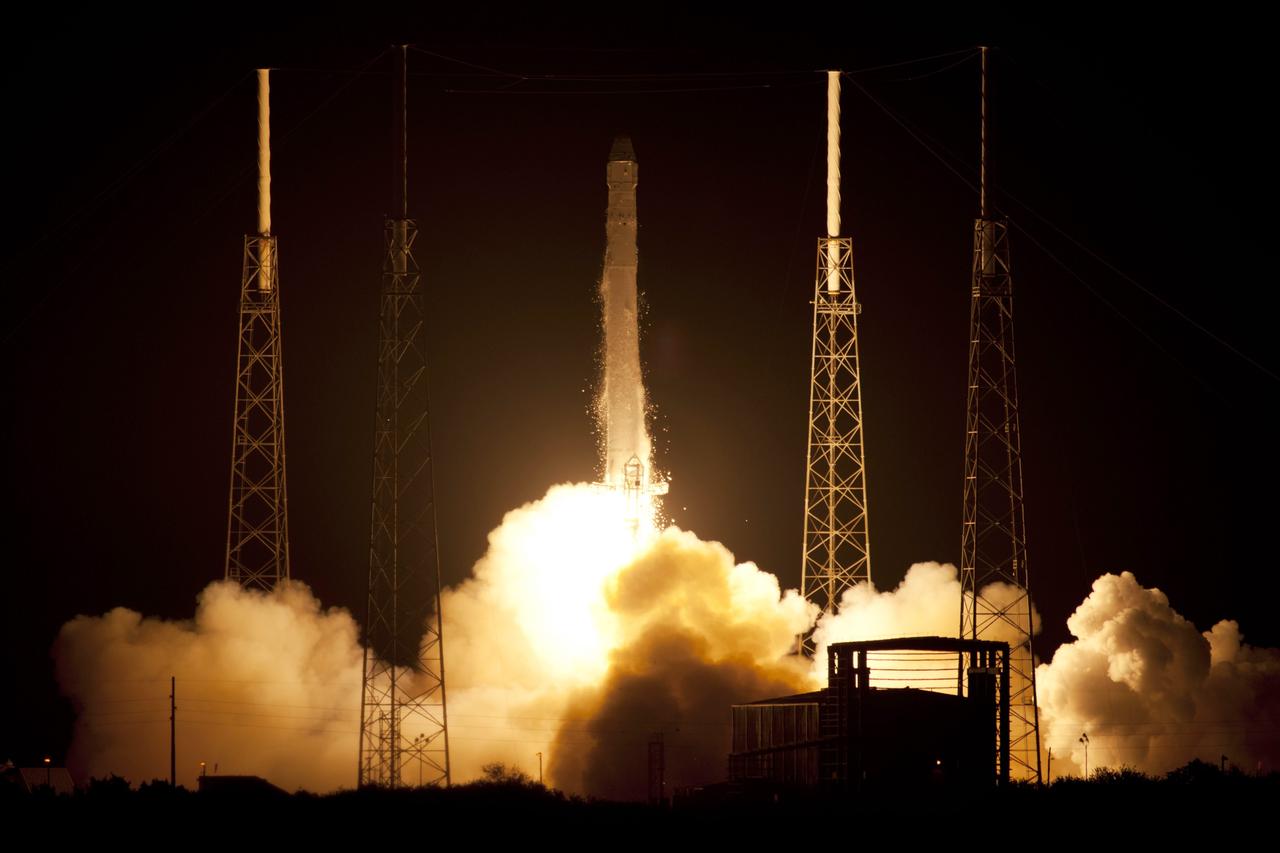 CAPE CANAVERAL, Fla. – Frost and ice breaks away from the SpaceX Falcon 9 rocket following ignition of its nine Merlin engines at 3:44 a.m. EDT at Space Launch Complex-40 on Cape Canaveral Air Force Station in Florida. The launch is the company's second demonstration test flight for NASA's Commercial Orbital Transportation Services, or COTS, Program. During the flight, the Dragon capsule will conduct a series of check-out procedures to test and prove its systems, including rendezvous and berthing with the International Space Station. If the capsule performs as planned, the cargo and experiments it is carrying will be transferred to the station. The cargo includes food, water and provisions for the station’s Expedition crews, such as clothing, batteries and computer equipment. Under COTS, NASA has partnered with two aerospace companies to deliver cargo to the station. For more information, visit http://www.nasa.gov/spacex. Photo credit: NASA/Rick Wetherington, Tim Powers and Tim Terry