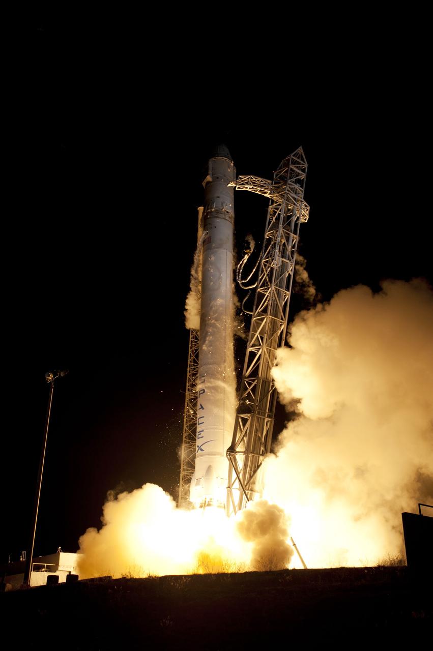 CAPE CANAVERAL, Fla. – Nine Merlin engines ignite under the SpaceX Falcon 9 rocket at 3:44 a.m. EDT at Space Launch Complex-40 on Cape Canaveral Air Force Station in Florida.    The launch is the company's second demonstration test flight for NASA's Commercial Orbital Transportation Services, or COTS, Program. During the flight, the Dragon capsule will conduct a series of check-out procedures to test and prove its systems, including rendezvous and berthing with the International Space Station.  If the capsule performs as planned, the cargo and experiments it is carrying will be transferred to the station. The cargo includes food, water and provisions for the station’s Expedition crews, such as clothing, batteries and computer equipment. Under COTS, NASA has partnered with two aerospace companies to deliver cargo to the station. For more information, visit http://www.nasa.gov/spacex.  Photo credit: NASA/Rick Wetherington, Tim Powers and Tim Terry