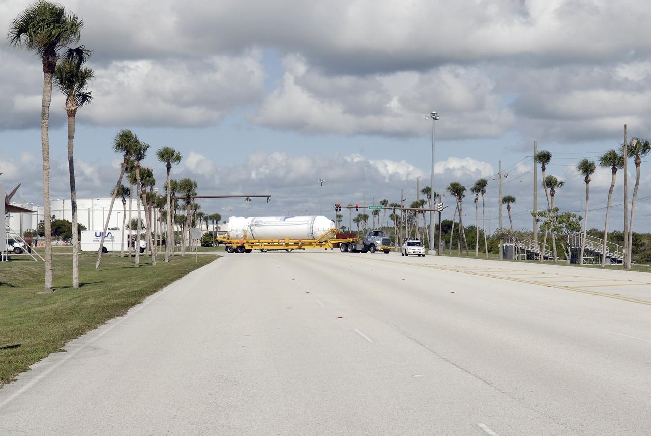 CAPE CANAVERAL, Fla. – The Centaur upper stage is taken from Port Canaveral to the Atlas Spaceflight Operations Center, or ASOC, to begin checkout for the launch of the Radiation Belt Storm Probes, or RBSP, mission. Photo credit: NASA/Charisse Nahser