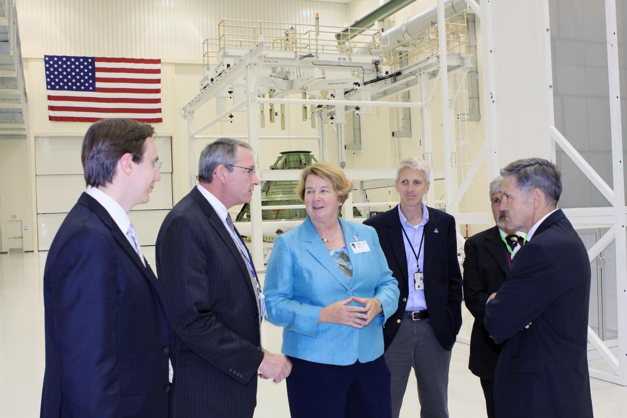 CAPE CANAVERAL, Fla. – Joanne Maguire, executive vice president of Space Systems for Lockheed Martin, and Kennedy Space Center Director Bob Cabana, far right, are accompanied by Lockheed Martin and NASA personnel during a tour of Kennedy's Operations and Checkout Building.     Lockheed Martin is the prime contractor to NASA for the Orion Multi-Purpose Crew Vehicle, which will be processed in the refurbished Operations and Checkout building. For more information, visit http://www.nasa.gov/exploration/systems/ground. Photo credit: NASA/Jim Grossmann