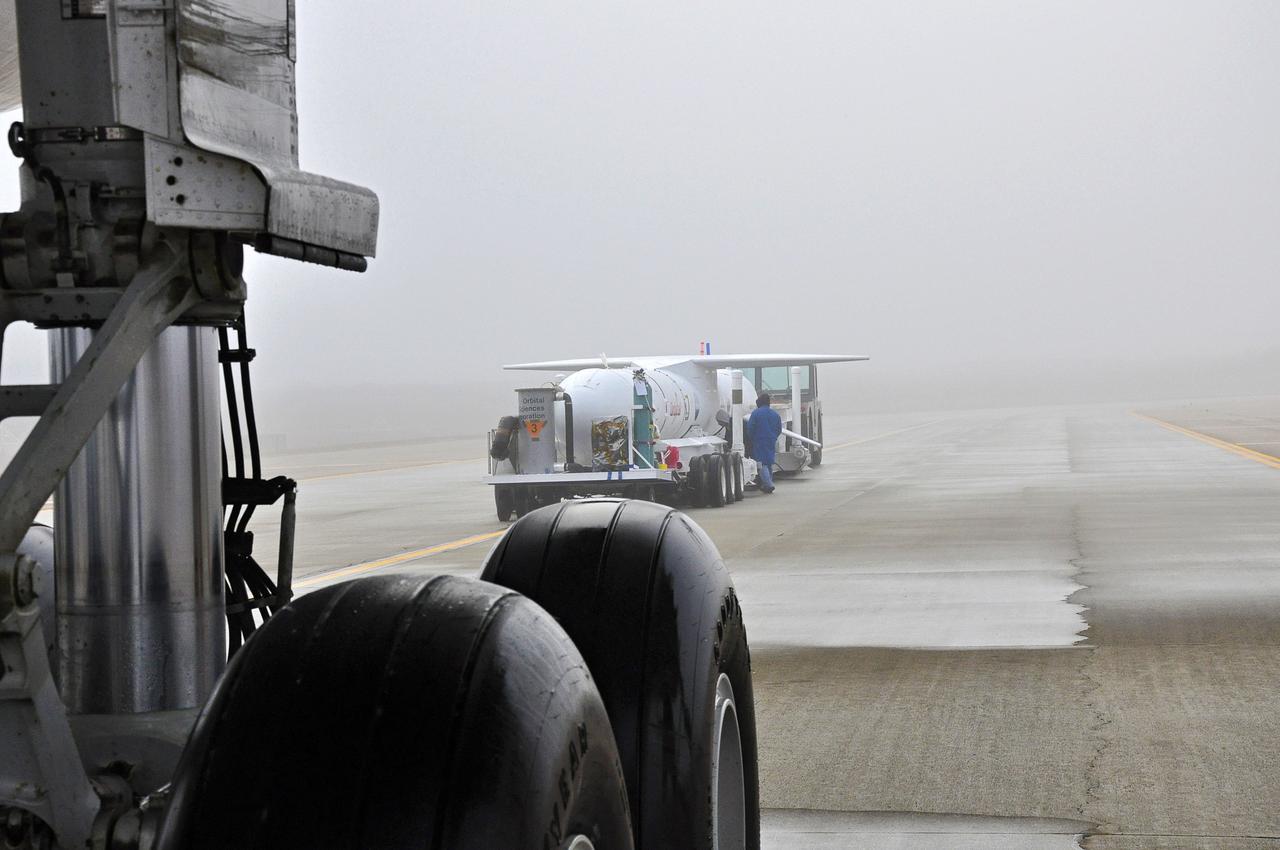 VANDENBERG AFB, Calif. – Technicians roll the Orbital Sciences Pegasus XL rocket with its NuSTAR spacecraft to the waiting L-1011 carrier aircraft known as "Stargazer." The Pegasus will launch NuSTAR into space where the high-energy x-ray telescope will conduct a census for black holes, map radioactive material in young supernovae remnants, and study the origins of cosmic rays and the extreme physics around collapsed stars. Photo credit: NASA/Randy Beaudoin, VAFB