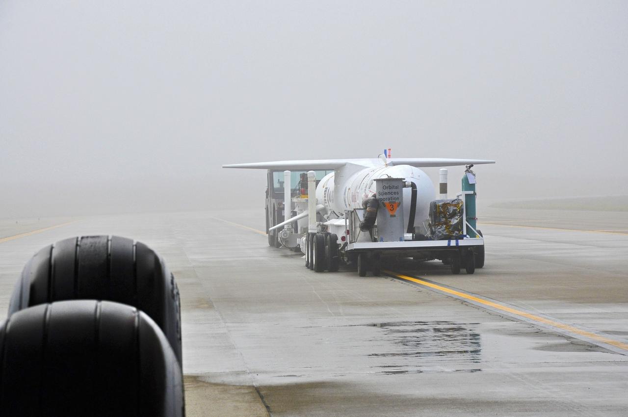 VANDENBERG AFB, Calif. – Technicians roll the Orbital Sciences Pegasus XL rocket with its NuSTAR spacecraft to the waiting L-1011 carrier aircraft known as "Stargazer." The Pegasus will launch NuSTAR into space where the high-energy x-ray telescope will conduct a census for black holes, map radioactive material in young supernovae remnants, and study the origins of cosmic rays and the extreme physics around collapsed stars. Photo credit: NASA/Randy Beaudoin, VAFB
