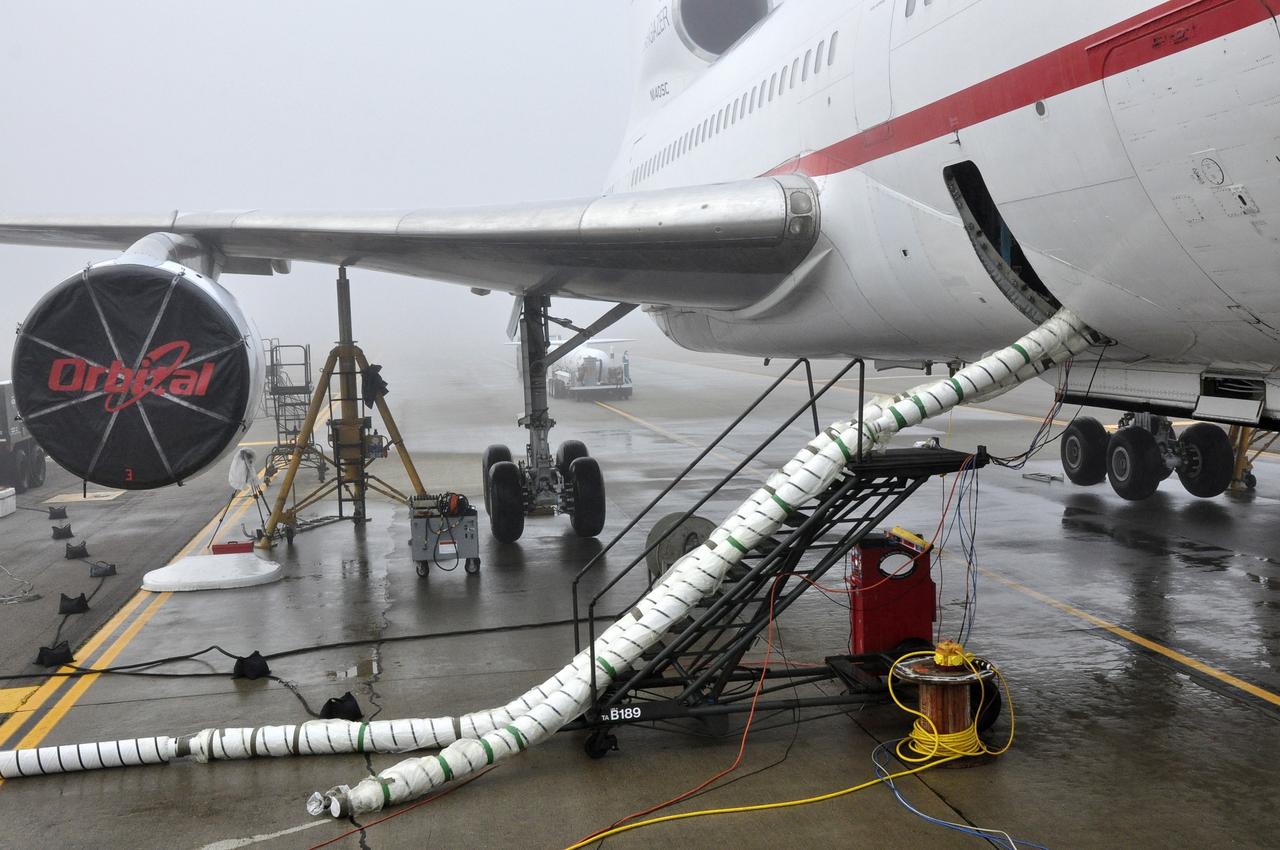 VANDENBERG AFB, Calif. – The Orbital Sciences L-1011 known as "Stargazer" awaits the Orbital Sciences Pegasus XL rocket with its NuSTAR spacecraft. The Pegasus will launch NuSTAR into space where the high-energy x-ray telescope will conduct a census for black holes, map radioactive material in young supernovae remnants, and study the origins of cosmic rays and the extreme physics around collapsed stars. Photo credit: NASA/Randy Beaudoin, VAFB