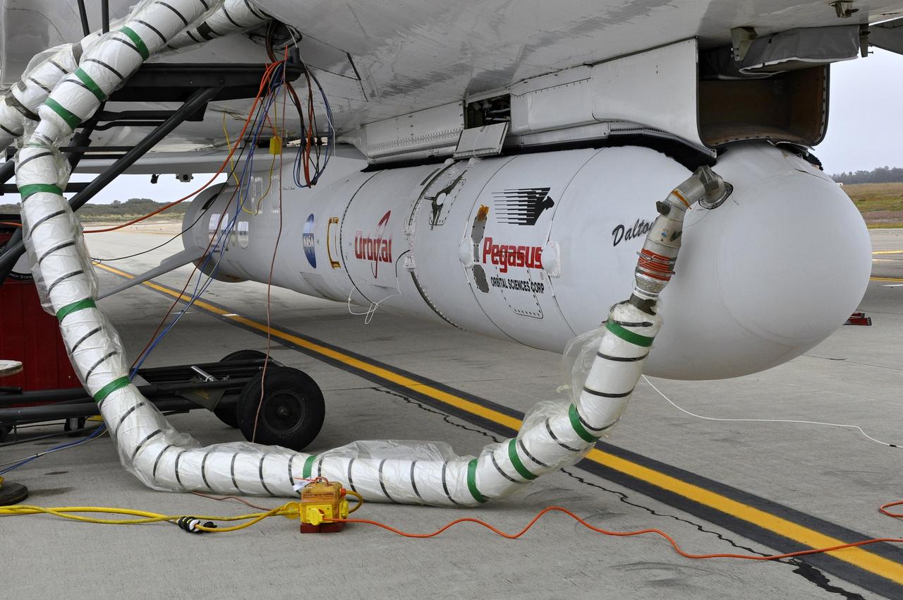 VANDENBERG AFB, Calif. – The Orbital Sciences Pegasus XL rocket with its NuSTAR spacecraft after attachment to the L-1011 carrier aircraft known as "Stargazer." The Pegasus will launch NuSTAR into space where the high-energy x-ray telescope will conduct a census for black holes, map radioactive material in young supernovae remnants, and study the origins of cosmic rays and the extreme physics around collapsed stars. Photo credit: NASA/Randy Beaudoin, VAFB