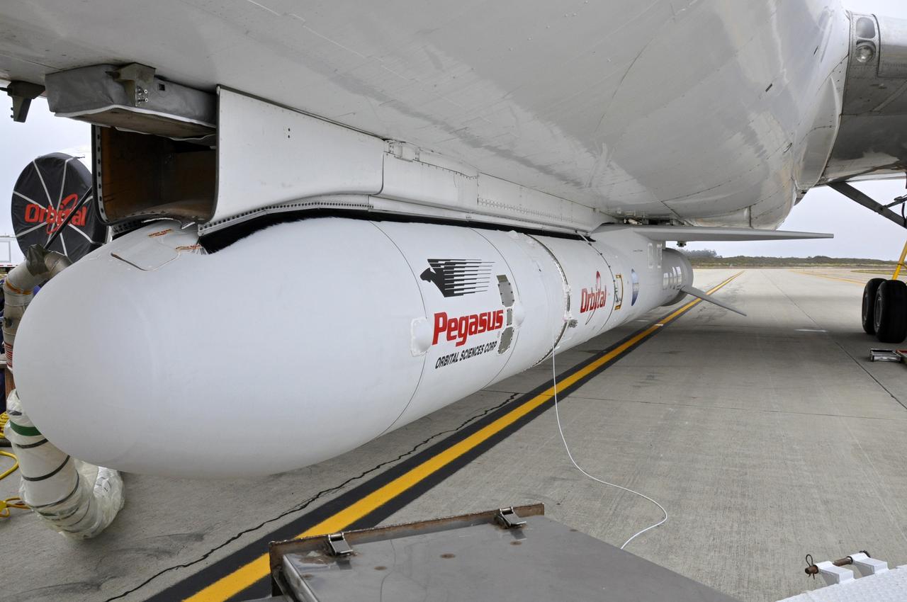 VANDENBERG AFB, Calif. – The Orbital Sciences Pegasus XL rocket with its NuSTAR spacecraft after attachment to the L-1011 carrier aircraft known as "Stargazer." The Pegasus will launch NuSTAR into space where the high-energy x-ray telescope will conduct a census for black holes, map radioactive material in young supernovae remnants, and study the origins of cosmic rays and the extreme physics around collapsed stars. Photo credit: NASA/Randy Beaudoin, VAFB