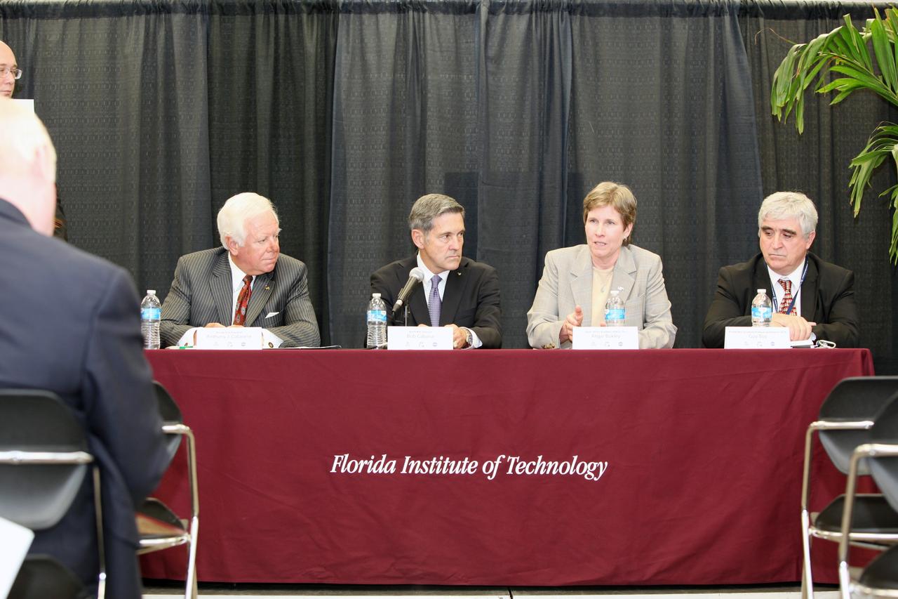 MELBOURNE, Fla. – Professor Angie Bukley, dean and vice president for Academic Affairs, International Space University, addresses the audience during opening ceremonies for the university's 25th annual Space Studies Program session at the Florida Institute of Technology in Melbourne, Fla.  Seated from left are Anthony J. Catanese, president of Florida Tech NASA Kennedy Space Center Director Bob Cabana Bukley and Dr. Guy A. Boy, chair of the Space Studies Program’s local organizing committee.    The nine-week intensive course is designed for post-graduate university students and professionals during the summer. The program is hosted by a different country each year, providing a unique educational experience for participants from around the globe. NASA Kennedy Space Center and Florida Tech are co-hosting this year's event which runs from June 4 to Aug. 3. This year, there are about 125 participants representing 31 countries. For more information, visit http://www.isunet.edu.  Photo credit: NASA/Dimitri Gerondidakis