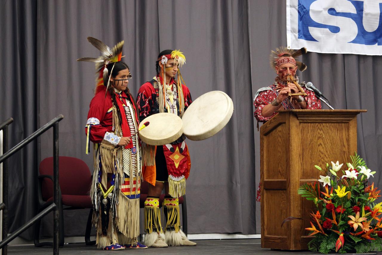 MELBOURNE, Fla. – Entertainment during the opening ceremonies for the International Space University's 25th annual Space Studies Program session at the Florida Institute of Technology in Melbourne, Fla., is provided by Jim Sawgrass and the Deep Forest Native American Indian Program dancers.     The nine-week intensive course is designed for post-graduate university students and professionals during the summer. The program is hosted by a different country each year, providing a unique educational experience for participants from around the globe. NASA Kennedy Space Center and Florida Tech are co-hosting this year's event which runs from June 4 to Aug. 3. This year, there are about 125 participants representing 31 countries. For more information, visit http://www.isunet.edu.  Photo credit: NASA/Dimitri Gerondidakis