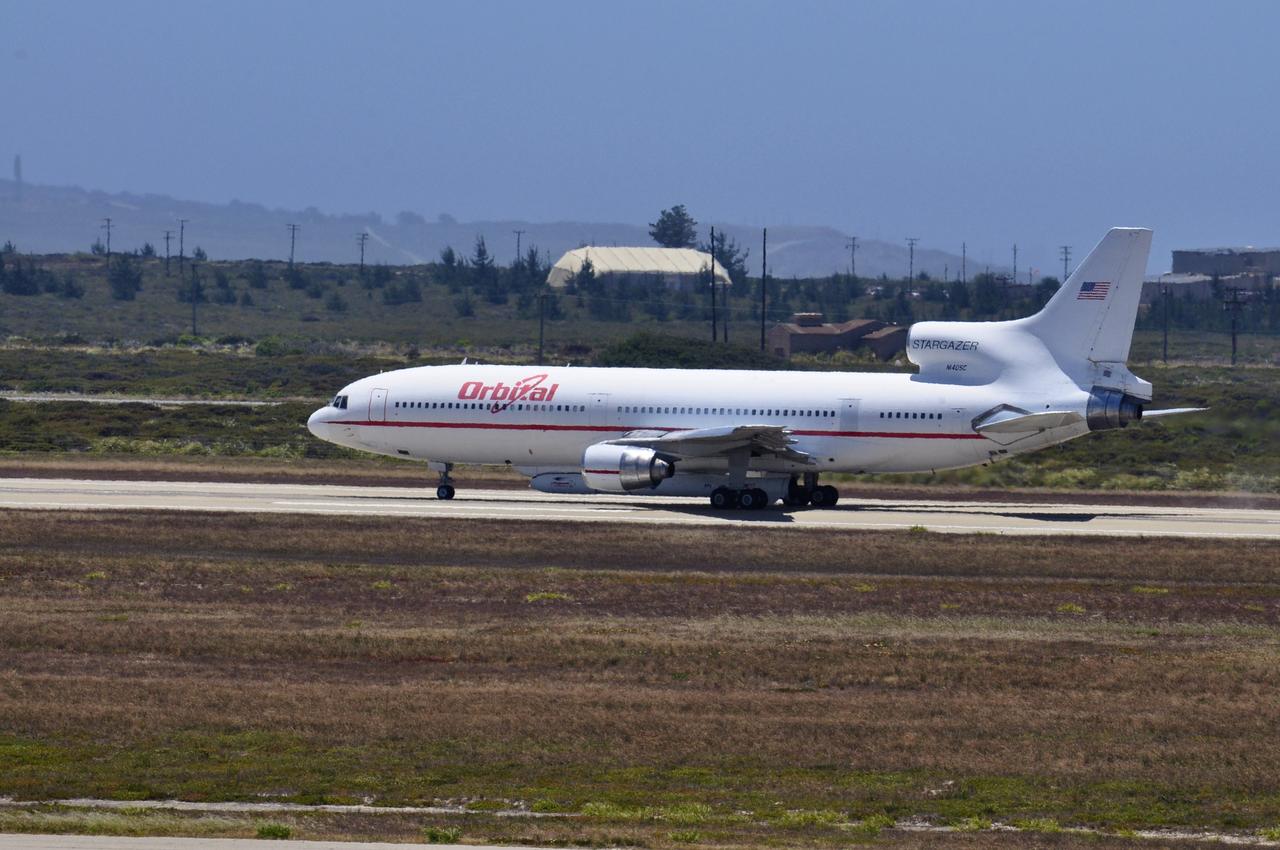VANDENBERG AIR FORCE BASE, Calif. – Orbital Sciences’ L-1011 carrier aircraft prepares for takeoff from the runway at Vandenberg Air Force Base in California.  The aircraft is transporting Orbital’s Pegasus rocket and NASA’s Nuclear Spectroscopic Telescope Array, or NuSTAR, to the U.S. Army's Ronald Reagan Ballistic Missile Defense Test Site on Kwajalein Atoll, part of the Marshall Islands in the Pacific Ocean.      The Pegasus, mated to its NuSTAR payload, will be launched from the carrier aircraft 117 nautical miles south of Kwajalein at latitude 6.75 degrees north of the equator.  The high-energy X-ray telescope will conduct a census of black holes, map radioactive material in young supernovae remnants, and study the origins of cosmic rays and the extreme physics around collapsed stars. Launch is scheduled for June 13.  For more information, visit http://www.nasa.gov/nustar.  Photo credit: NASA/Randy Beaudoin, VAFB
