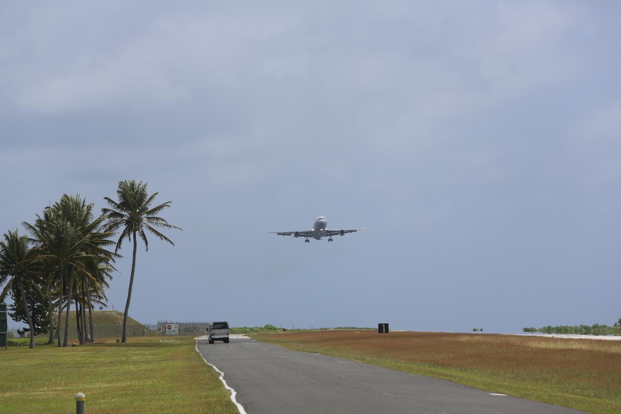 KWAJALEIN ATOLL, Marshall Islands – Orbital Sciences' L-1011 carrier aircraft approaches the runway at the U.S. Army's Ronald Reagan Ballistic Missile Defense Test Site on Kwajalein Atoll to deliver Orbital’s Pegasus rocket and NASA’s Nuclear Spectroscopic Telescope Array, or NuSTAR, for launch.    The Pegasus, mated to its NuSTAR payload, will be launched from the carrier aircraft 117 nautical miles south of Kwajalein at latitude 6.75 degrees north of the equator.  The high-energy X-ray telescope will conduct a census of black holes, map radioactive material in young supernovae remnants, and study the origins of cosmic rays and the extreme physics around collapsed stars. Launch and deployment of the telescope is scheduled for June 13.  For more information, visit http://www.nasa.gov/nustar.  Photo courtesy of Orbital Sciences Corp.